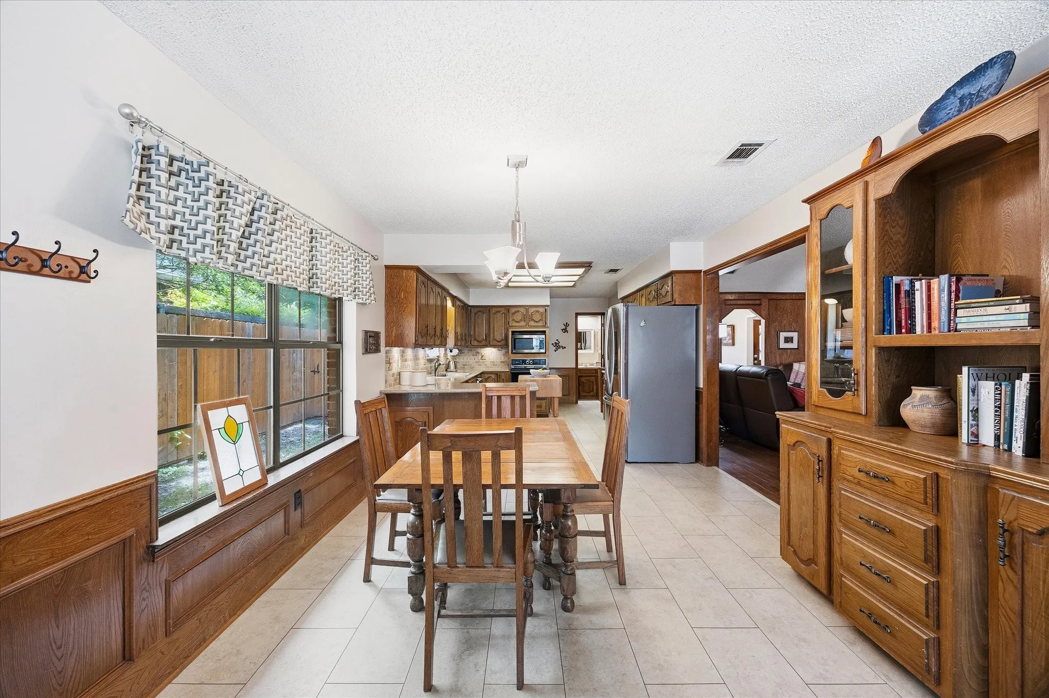 Open floor plan features kitchen opening onto breakfast area and living area