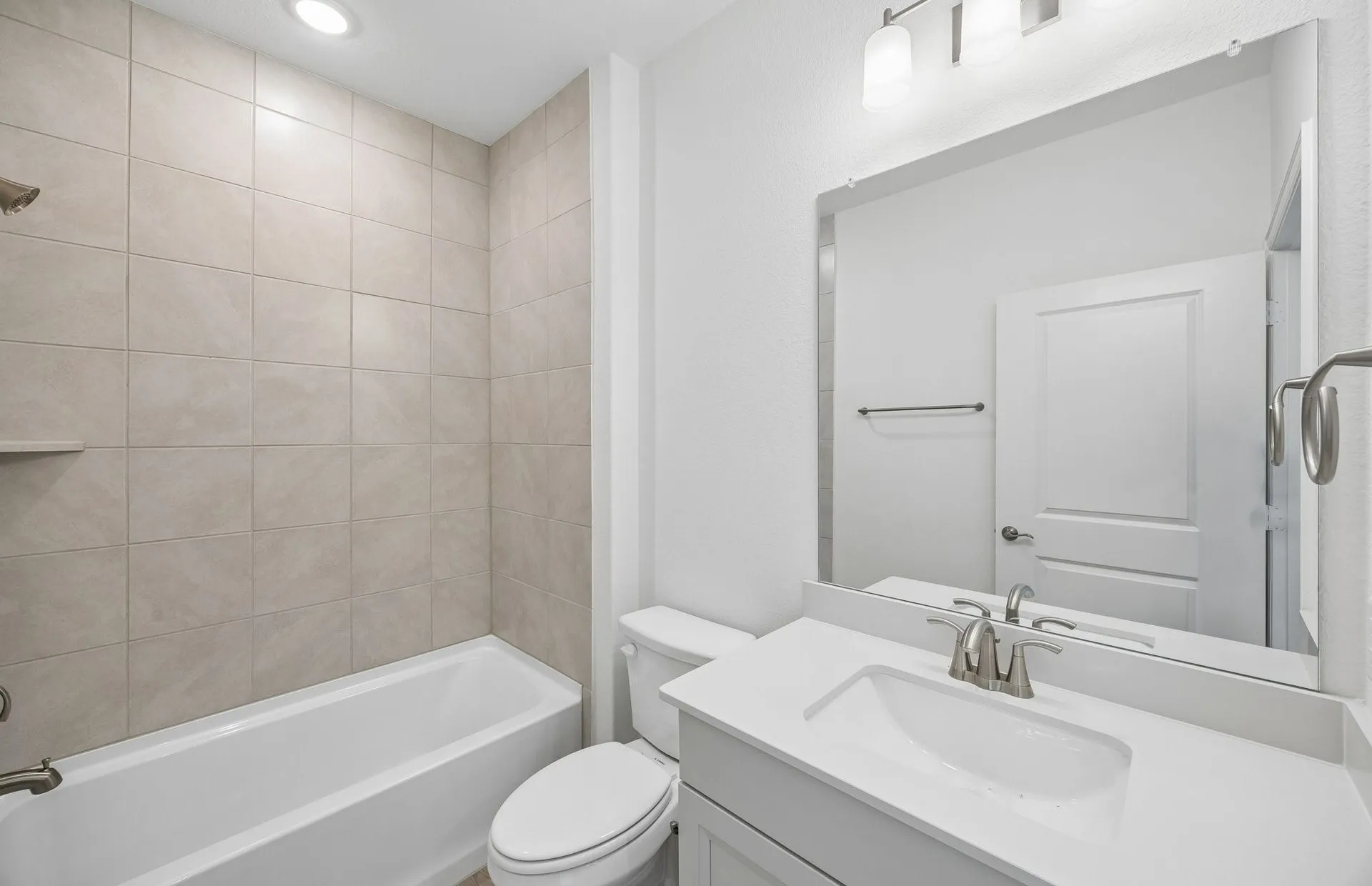 Secondary bath with tile surrounded shower