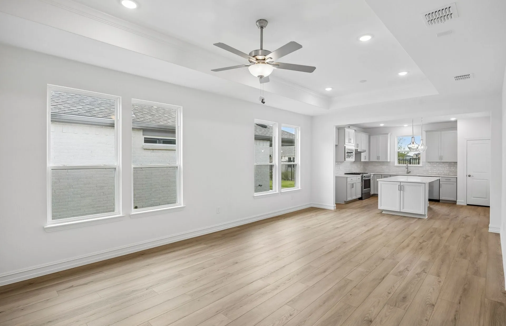 Tray ceiling and large windows in living room