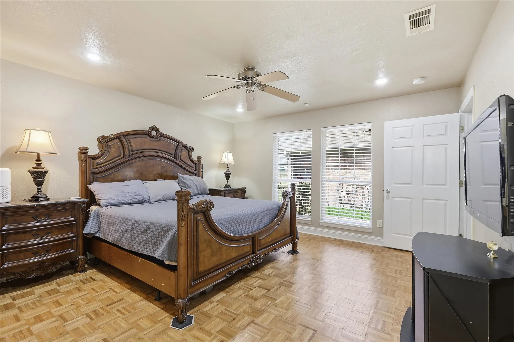 Owner's suite #2 with entrance to courtyard and enclosed patio