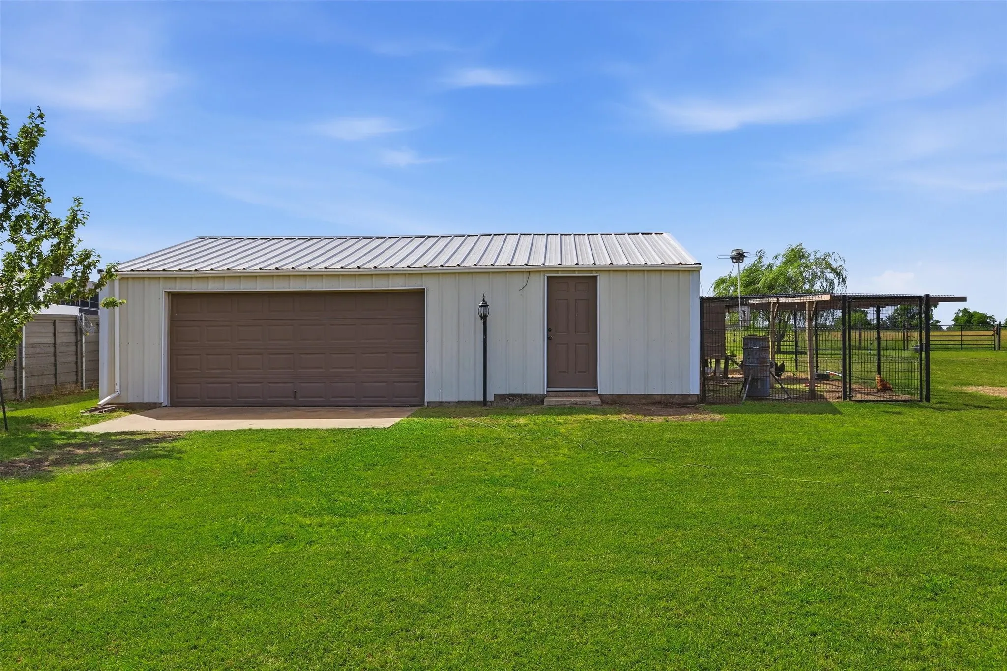Second garage, shop or barn with attached chicken coup