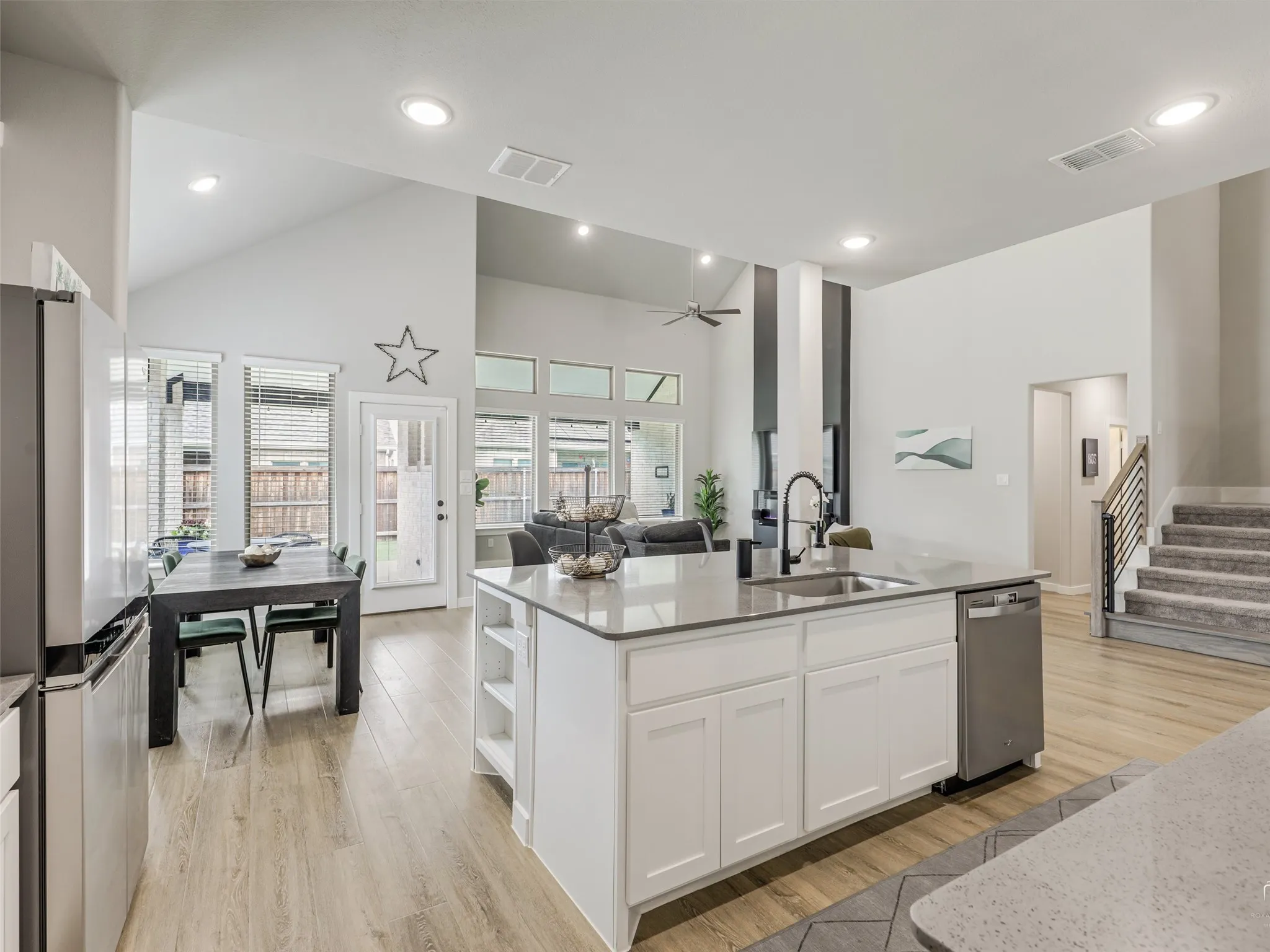 Open and spacious concept. Lots of electrical outlets on the island and on counter tops.
