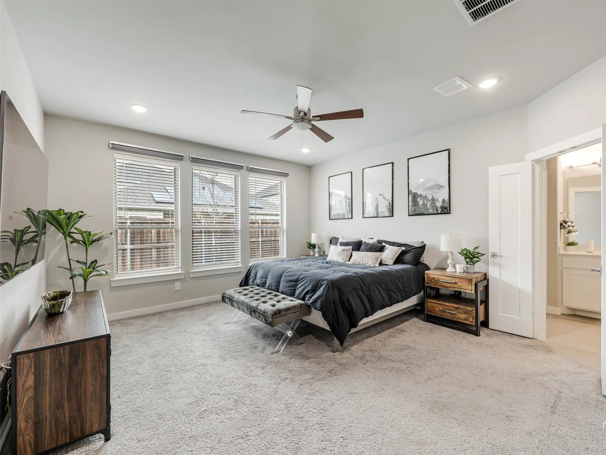 The Primary bedroom is private and has auto black out shades included.