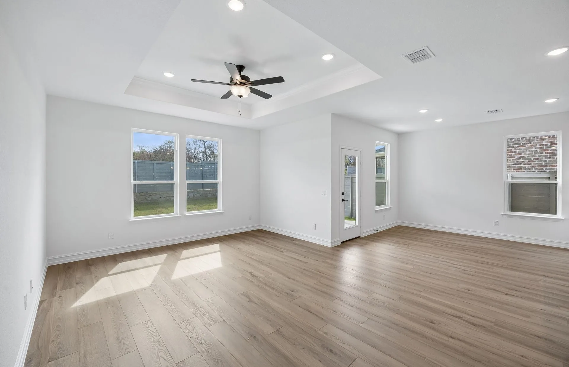 Large windows and trail ceiling in gathering room
