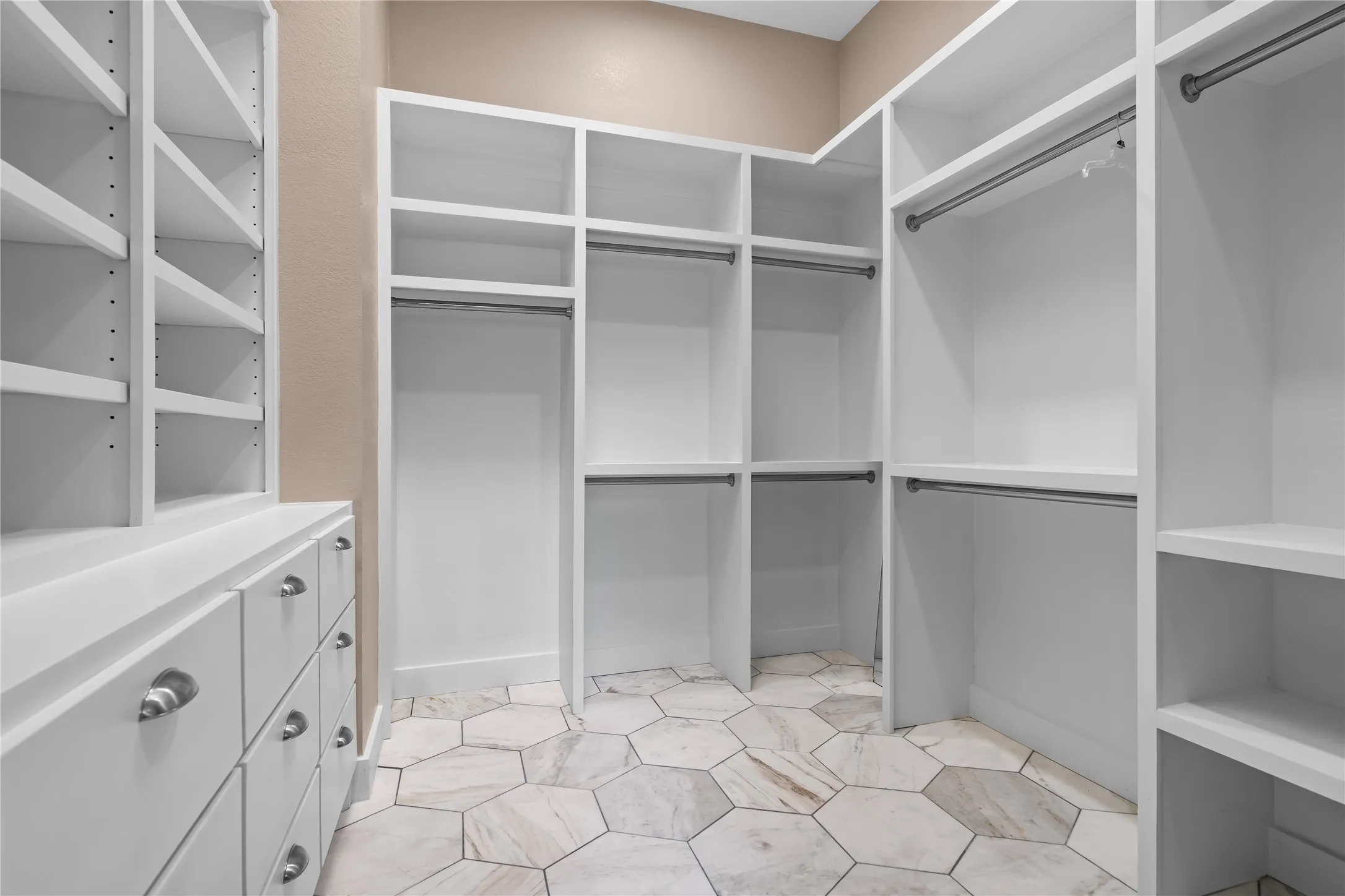 Custom closet system featuring hexagonal floor tiling