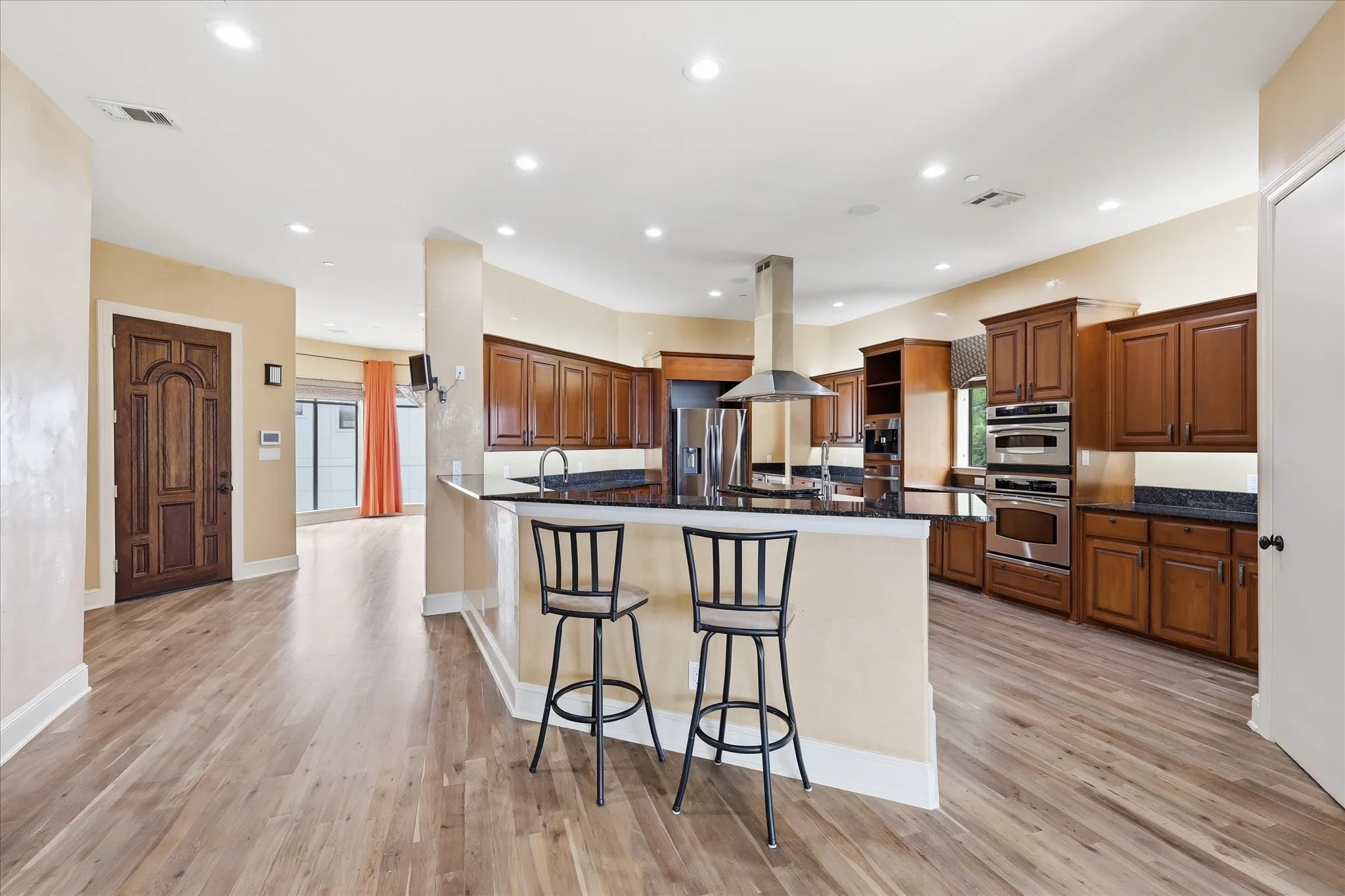 Kitchen, front door and dining room