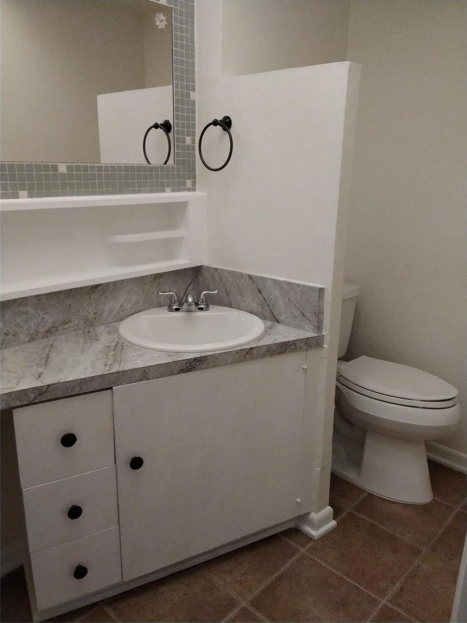 HOME HAS THIS FULL BATH PLUS HALF BATH
