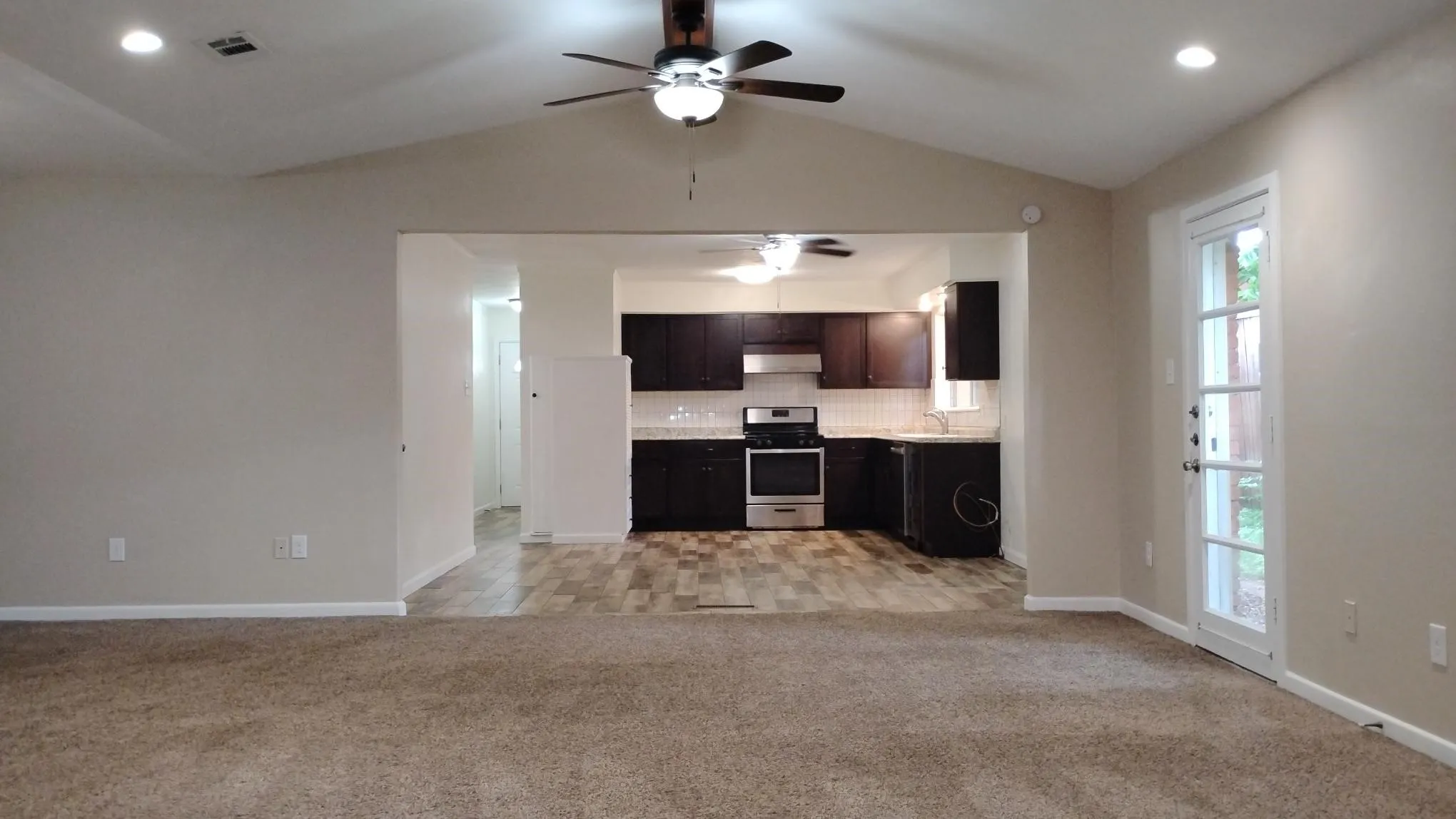 VIEW FROM DEN INTO KITCHEN