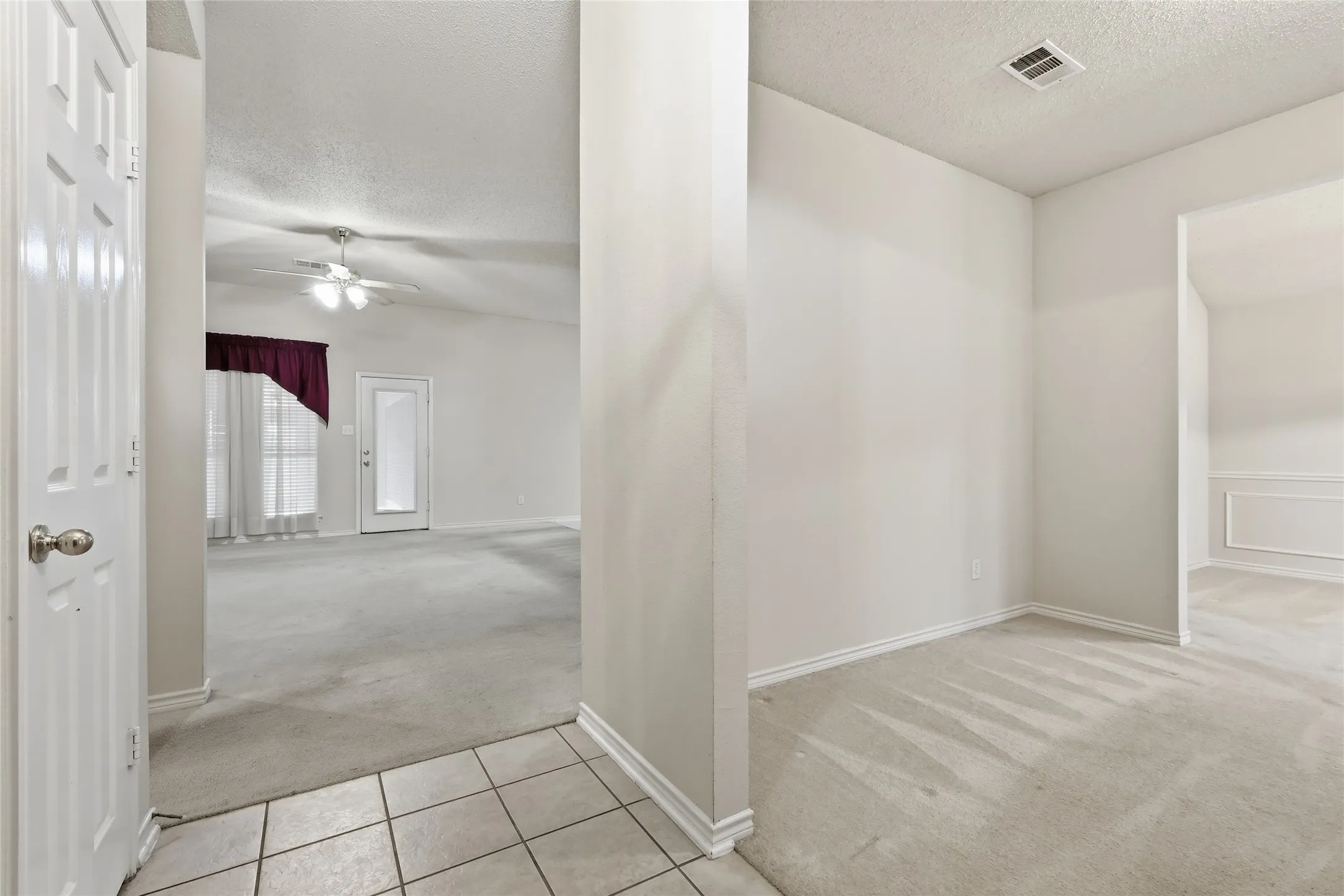 Front entryway - living dining rooms to right, leads into family room