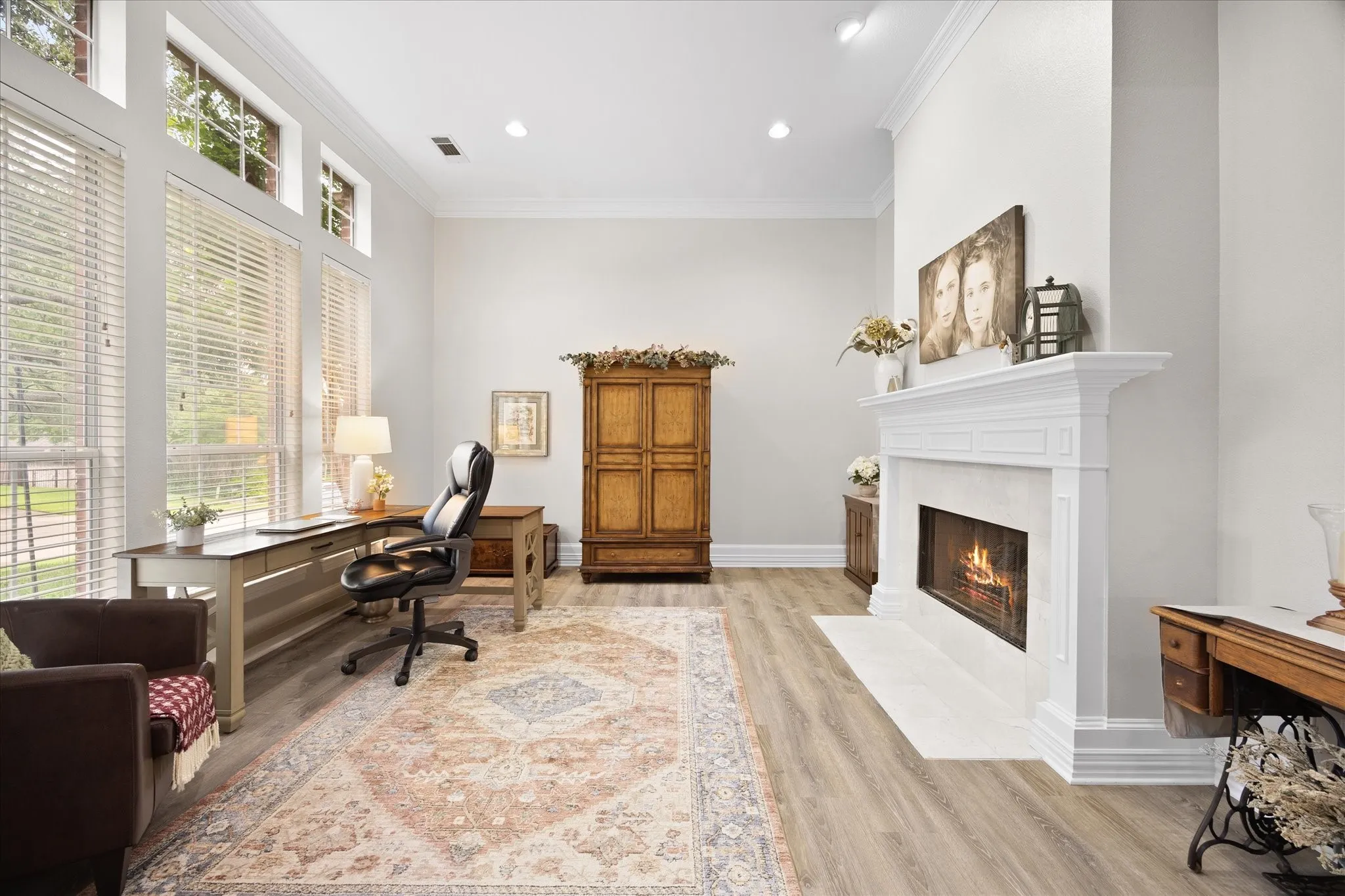 Home office includes gorgeous fireplace