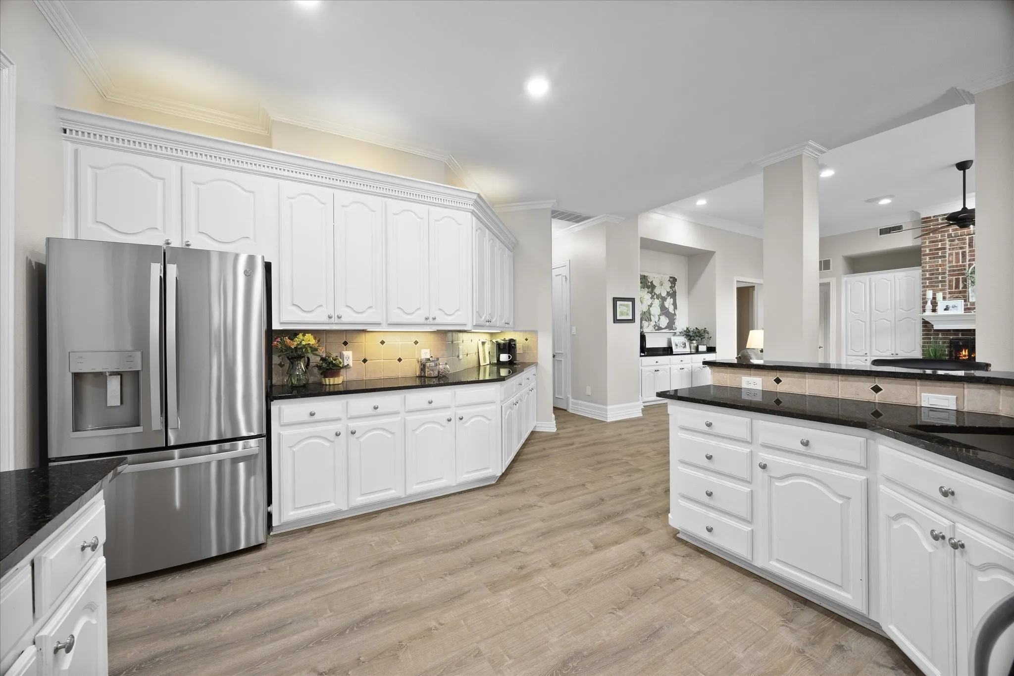 An abundance of custom cabinetry and countertops is a plus!