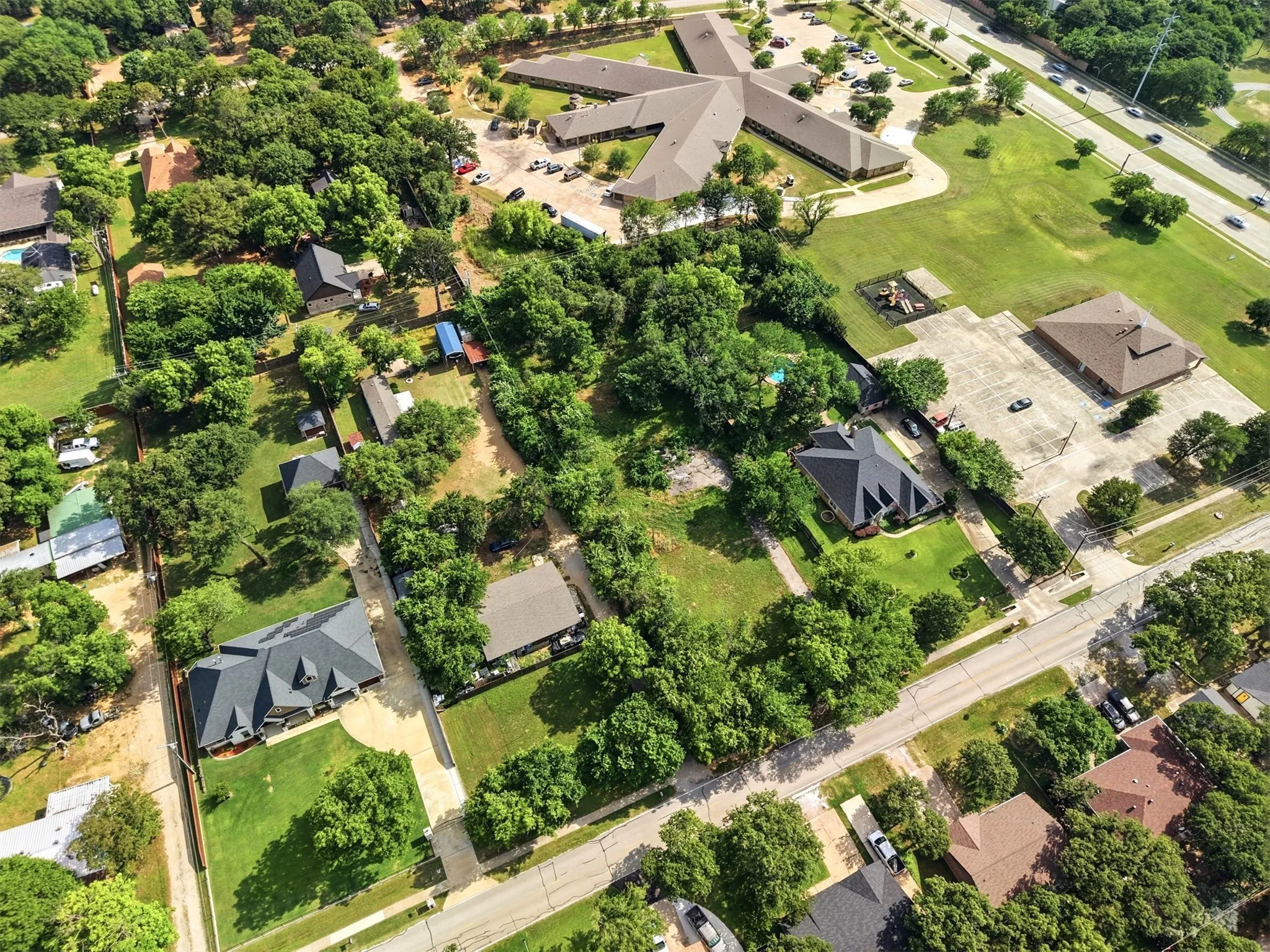 Perfectly situated in between custom homes in an established neighborhood