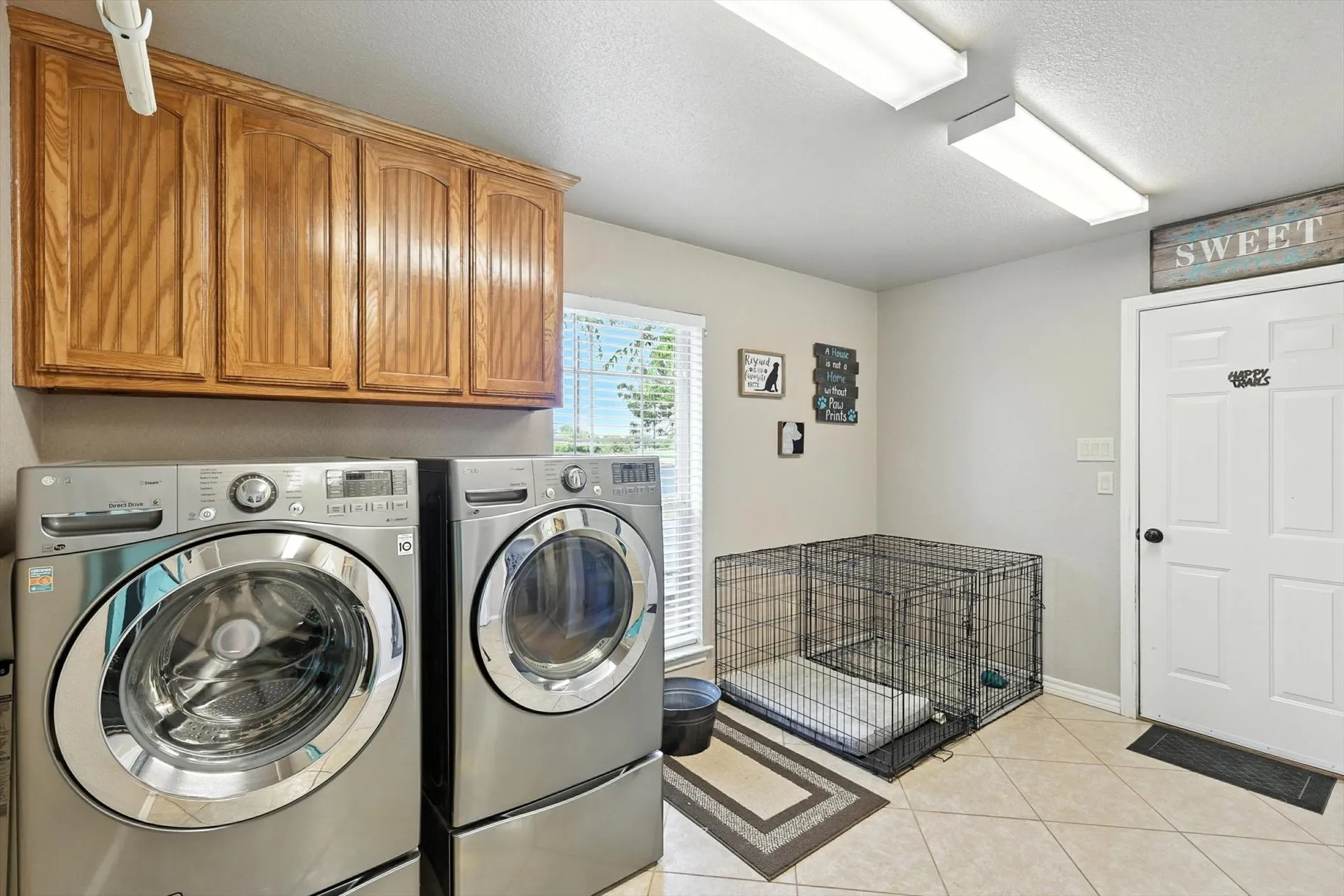 Over sized Laundry connects the garage to the Kitchen