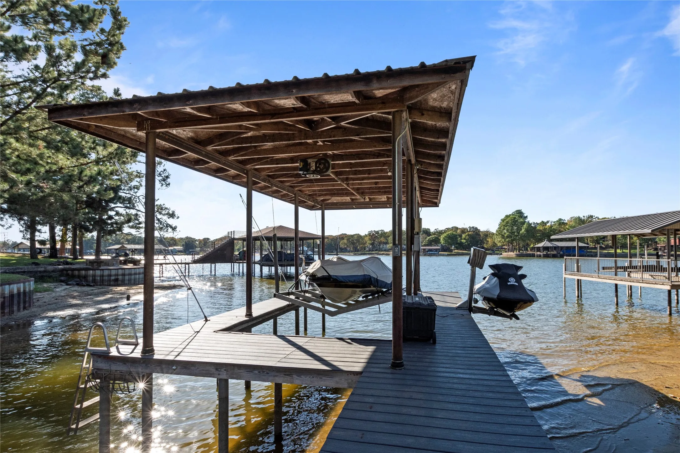 Private boat dock with cradle lift boat slip and PWC lift
