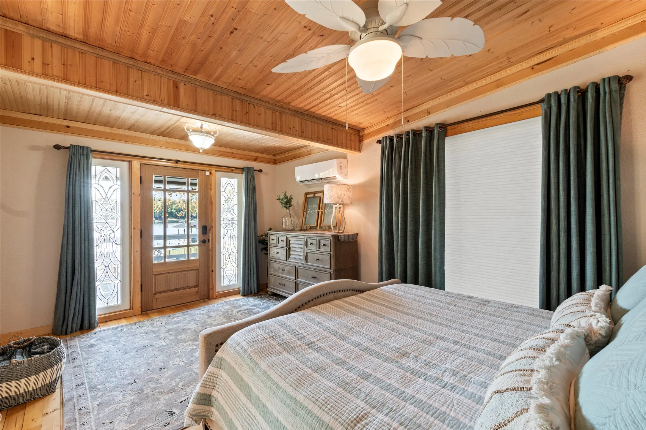 Primary suite with direct access to the patio and outdoor living space