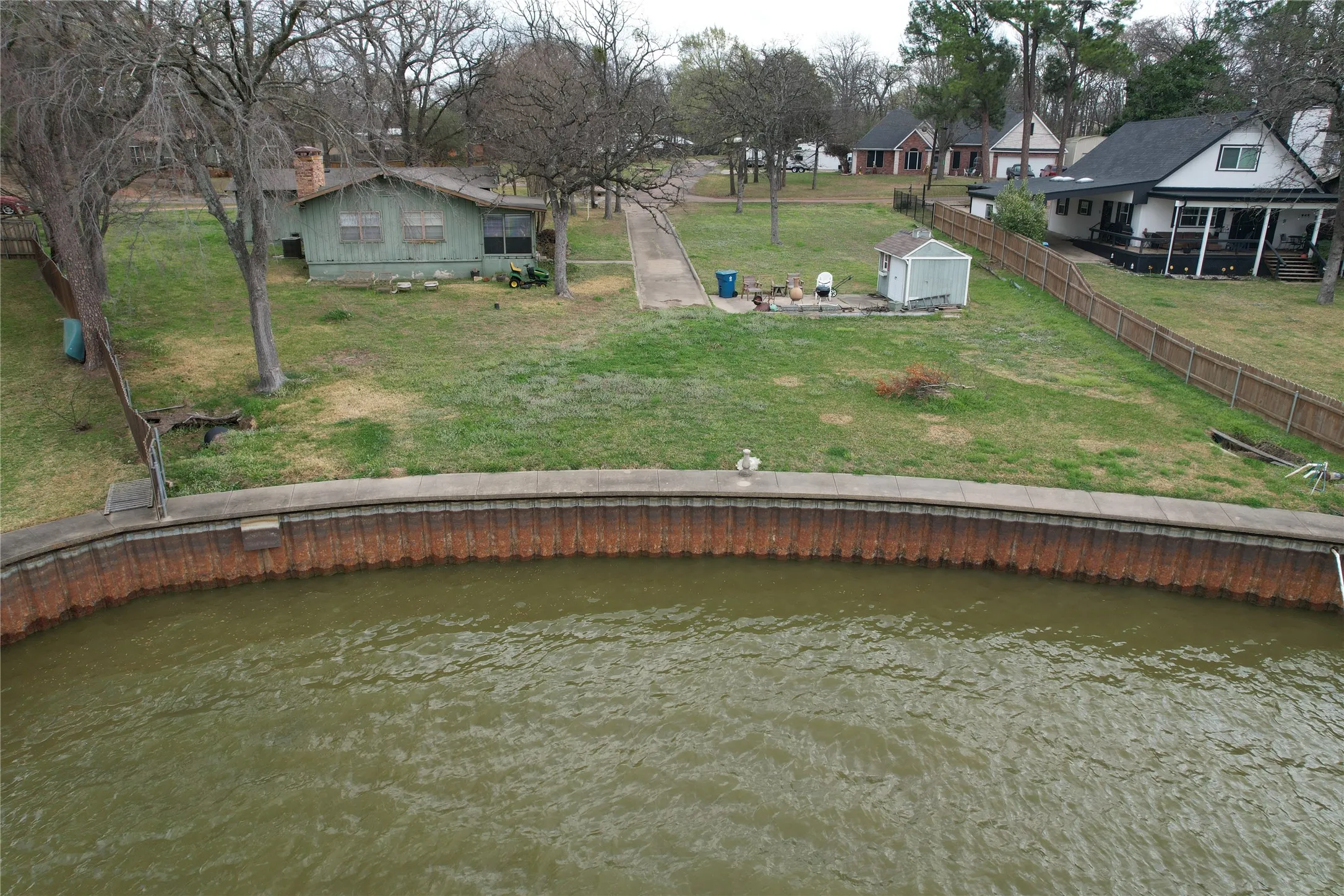 LAND OF OPPORTUNITY! WOW what would you design and build on this design friendly land shape, depth, and location? Behind the camera is a HUGE VIEW of CEDAR CREEK LAKE!