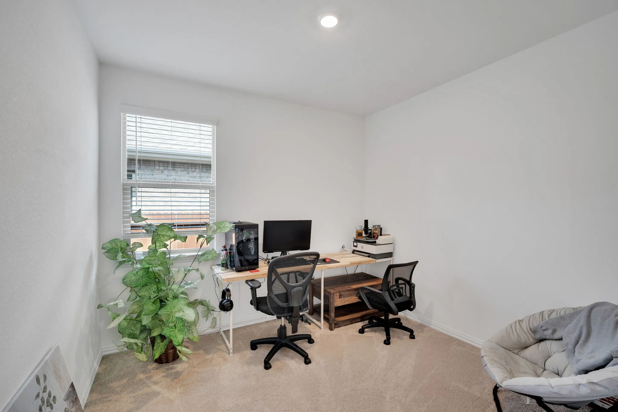Room featuring neutral carpeting and white painted walls