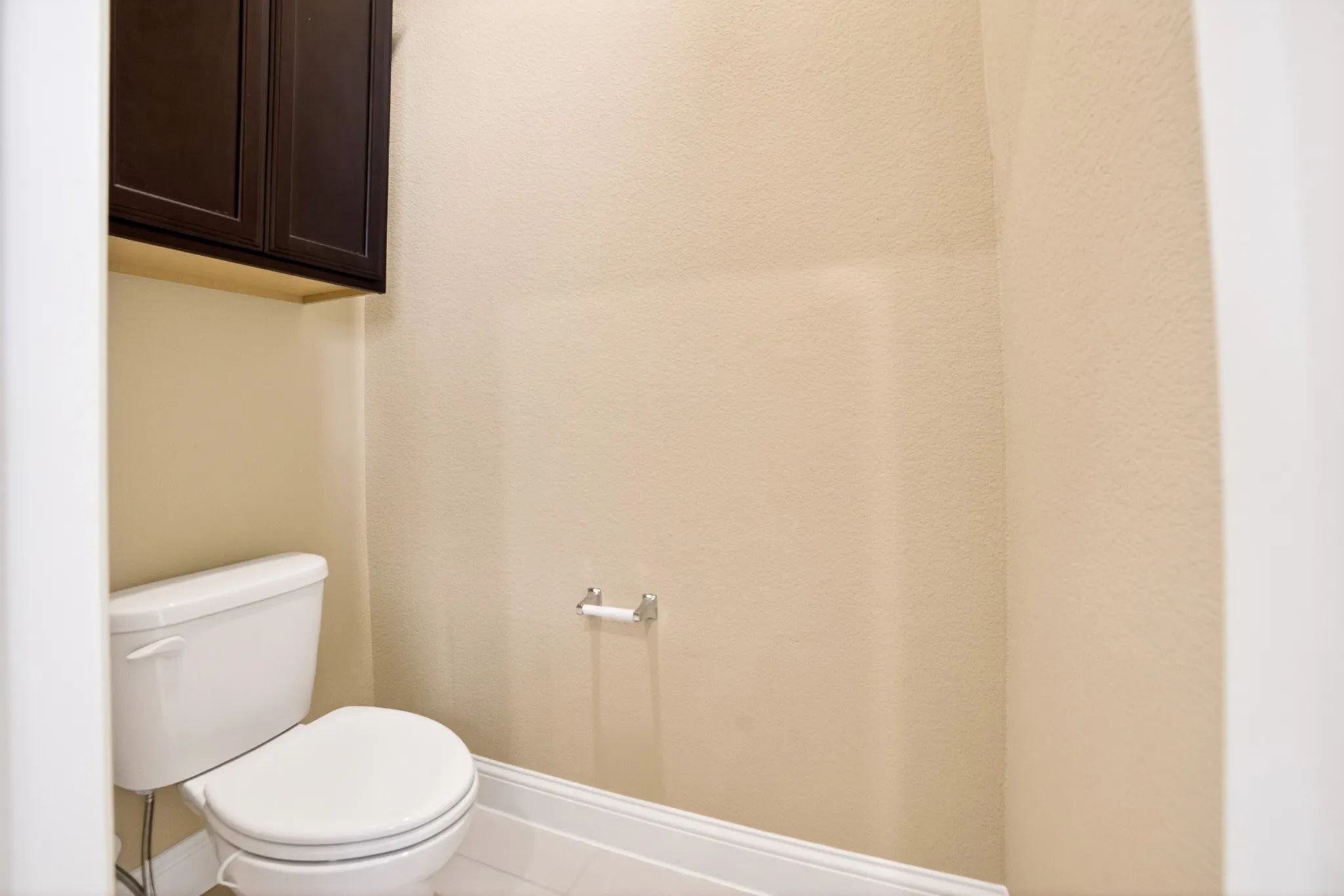Privacy room with cabinets for commode