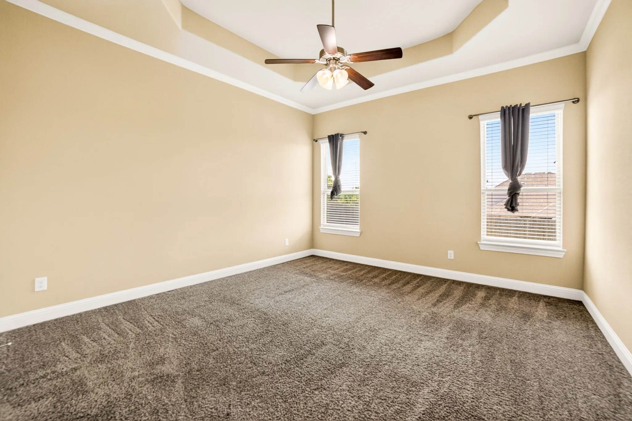 Large Master Suite (Bedroom #1) with recessed ceiling and plenty of room for king size bed and bug screen tv...2 windows overlook backyard