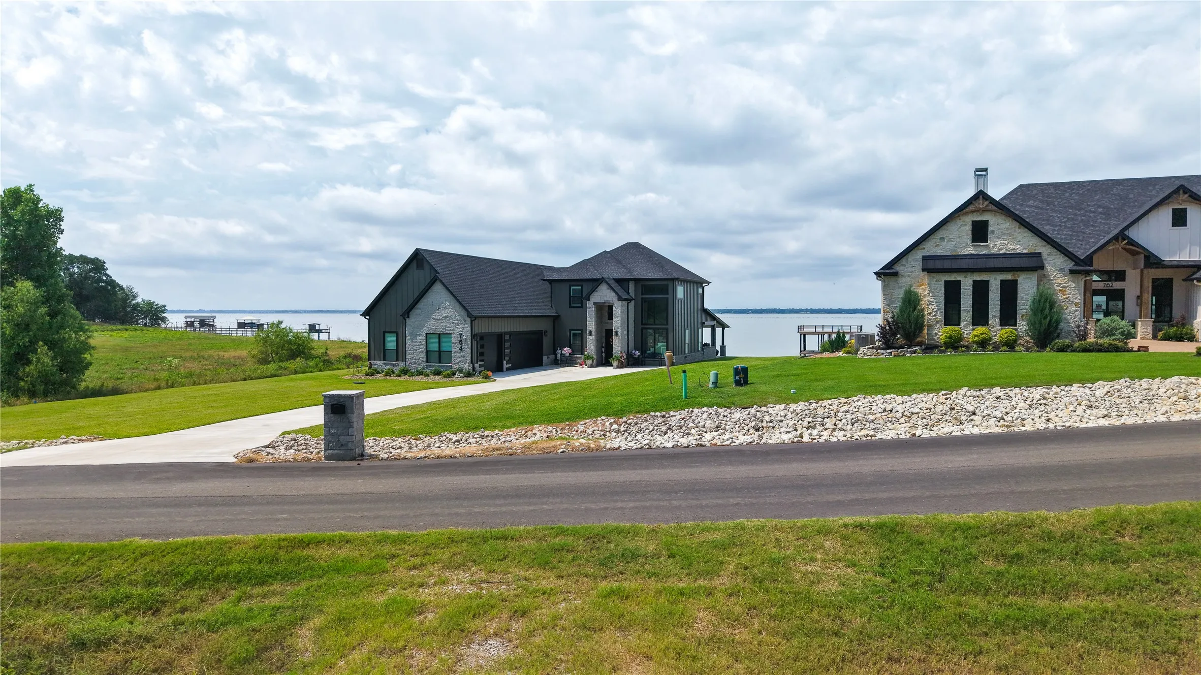 Lot surrounded by upscale waterfront and luxury custom homes