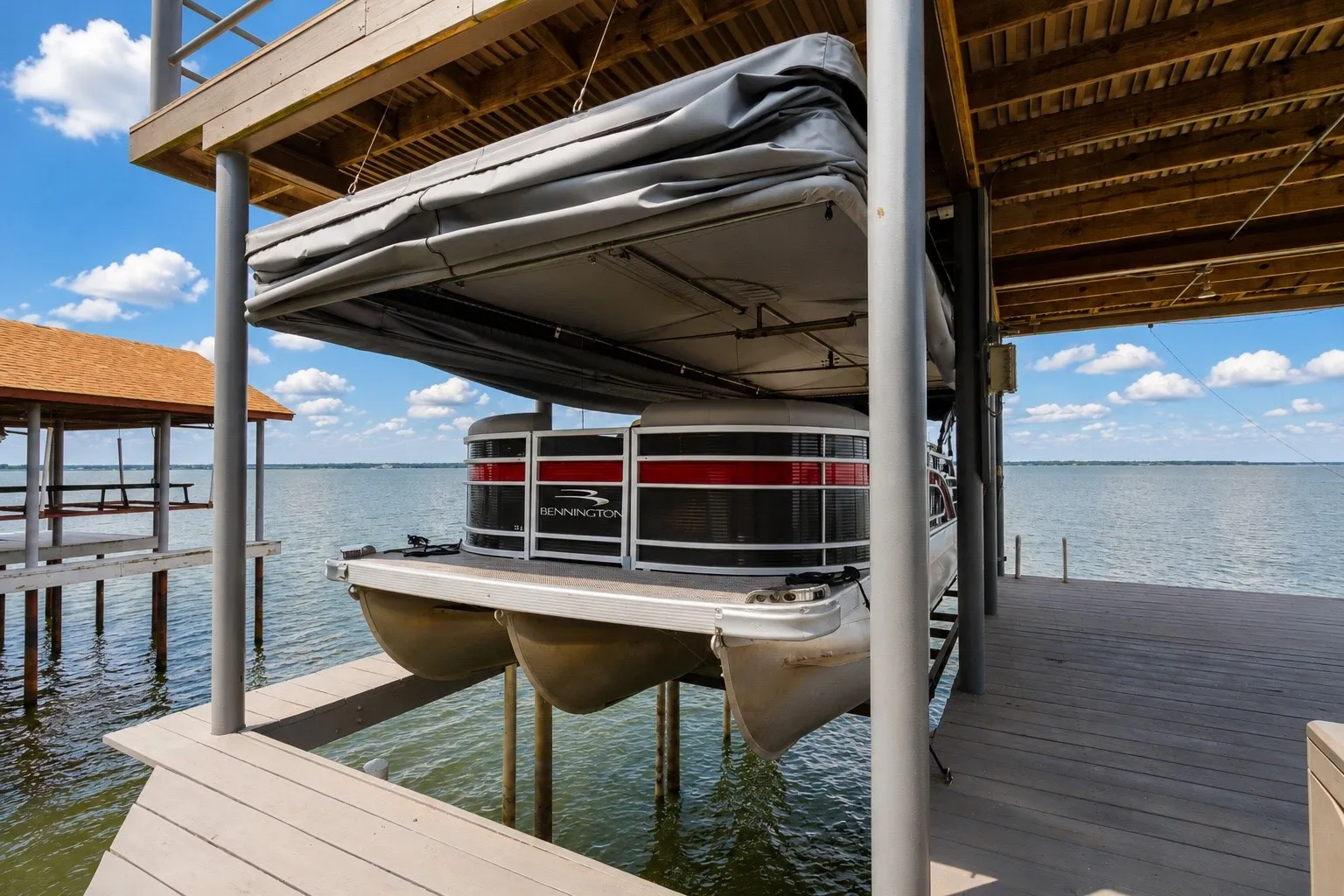 Boat Slip with Pontoon Cradle and Touchless Boat Cover