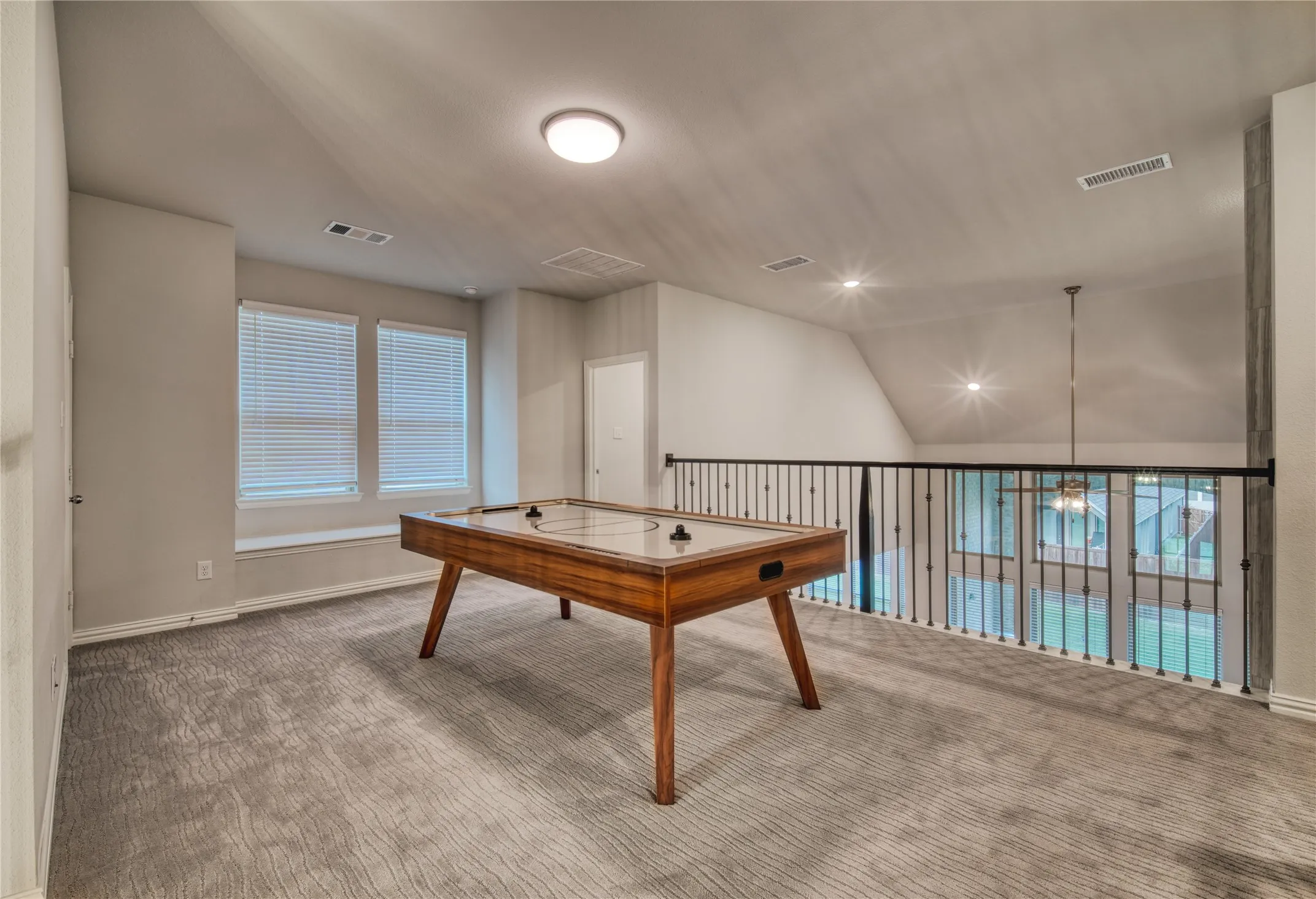 Game room featuring lofted ceiling, carpet floors, and recessed​​‌​​​​‌​​‌‌​‌‌​​​‌‌​‌​‌​‌​​​‌​​ lighting