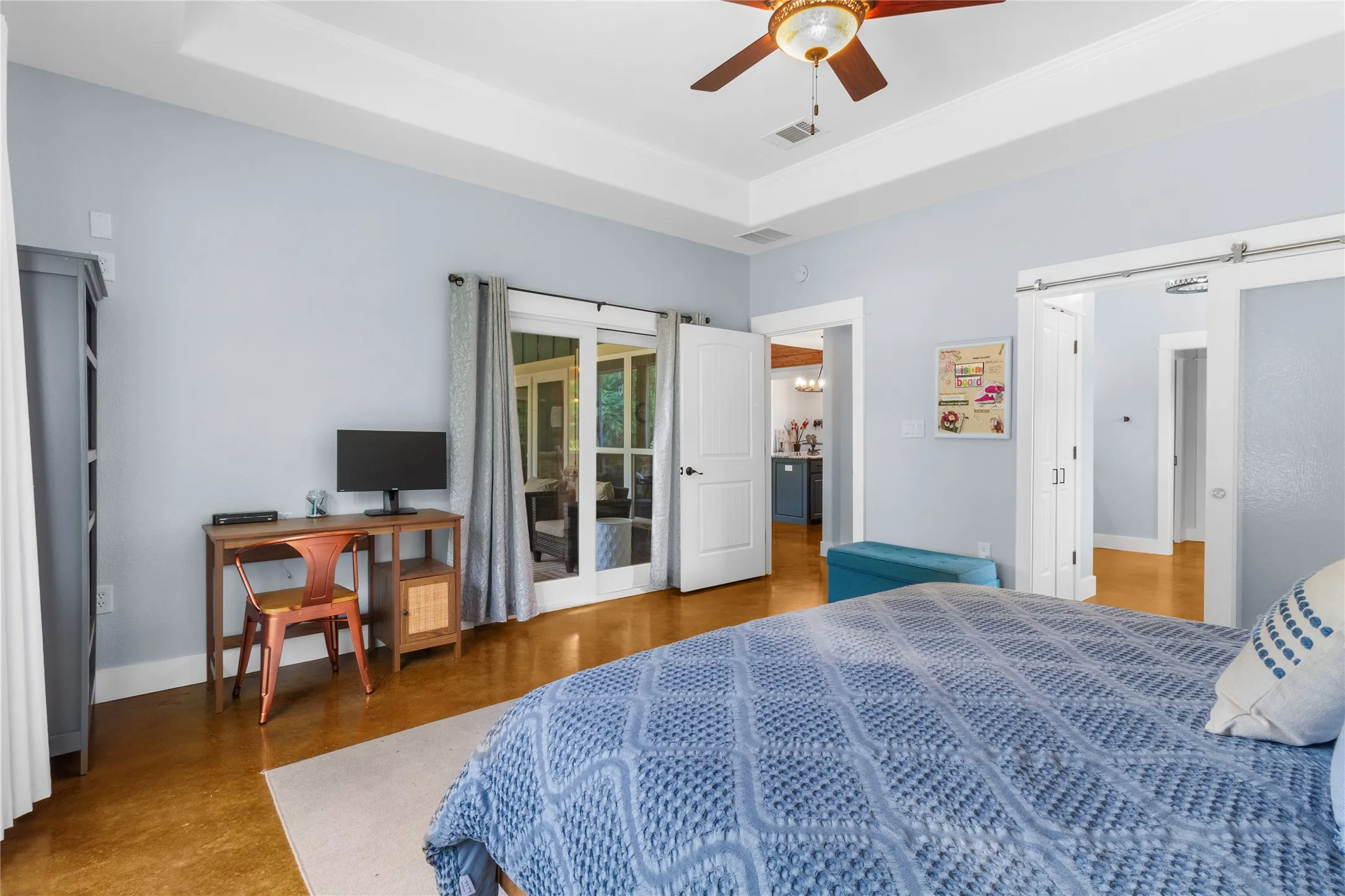 Primary Suite with direct access to Screened Patio