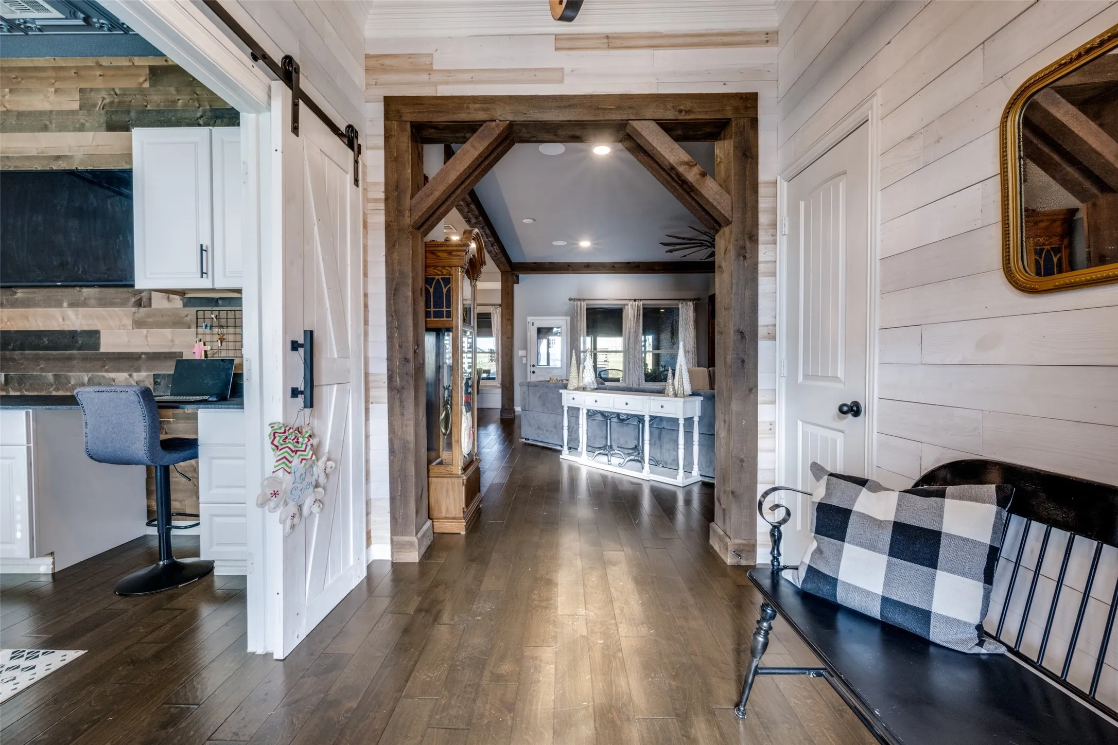 ACCENTED WOOD BEAMS THROUGHOUT~CUSTOM DOOR CASINGS~BARN DOORS FOR PRIVACY IN HOME OFFICE~