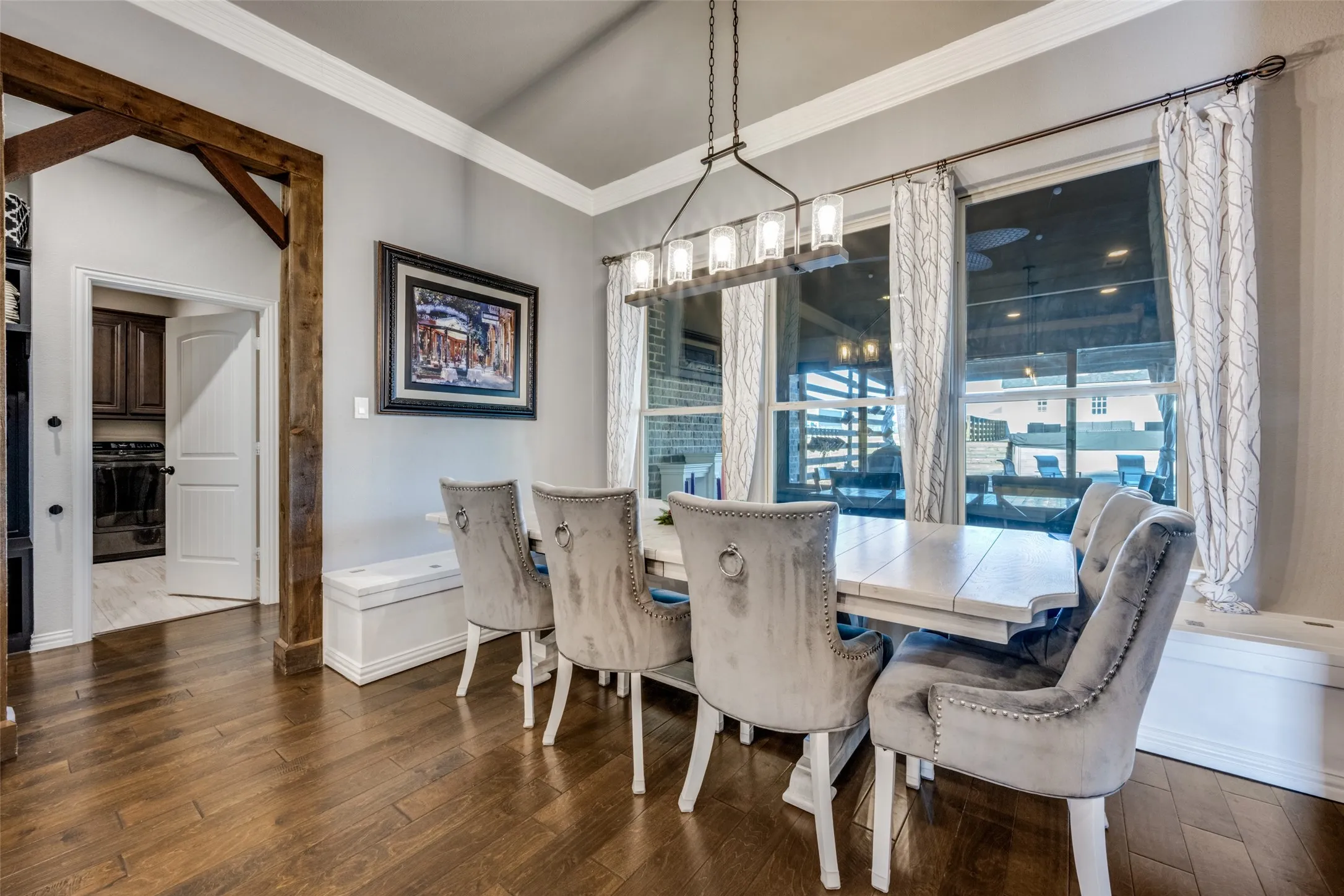 REGAL DINING SPACE WITH BUILT IN SEATING FOR 8 OR MORE GUESTS~