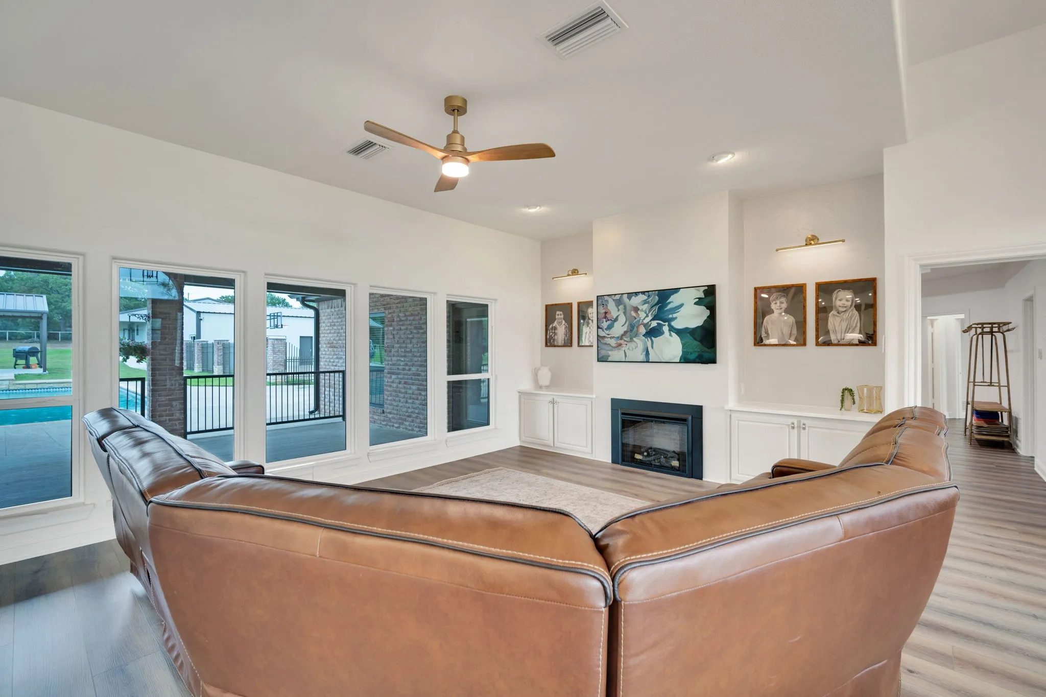 Spacious living area with a beautiful view of the patio and pool.