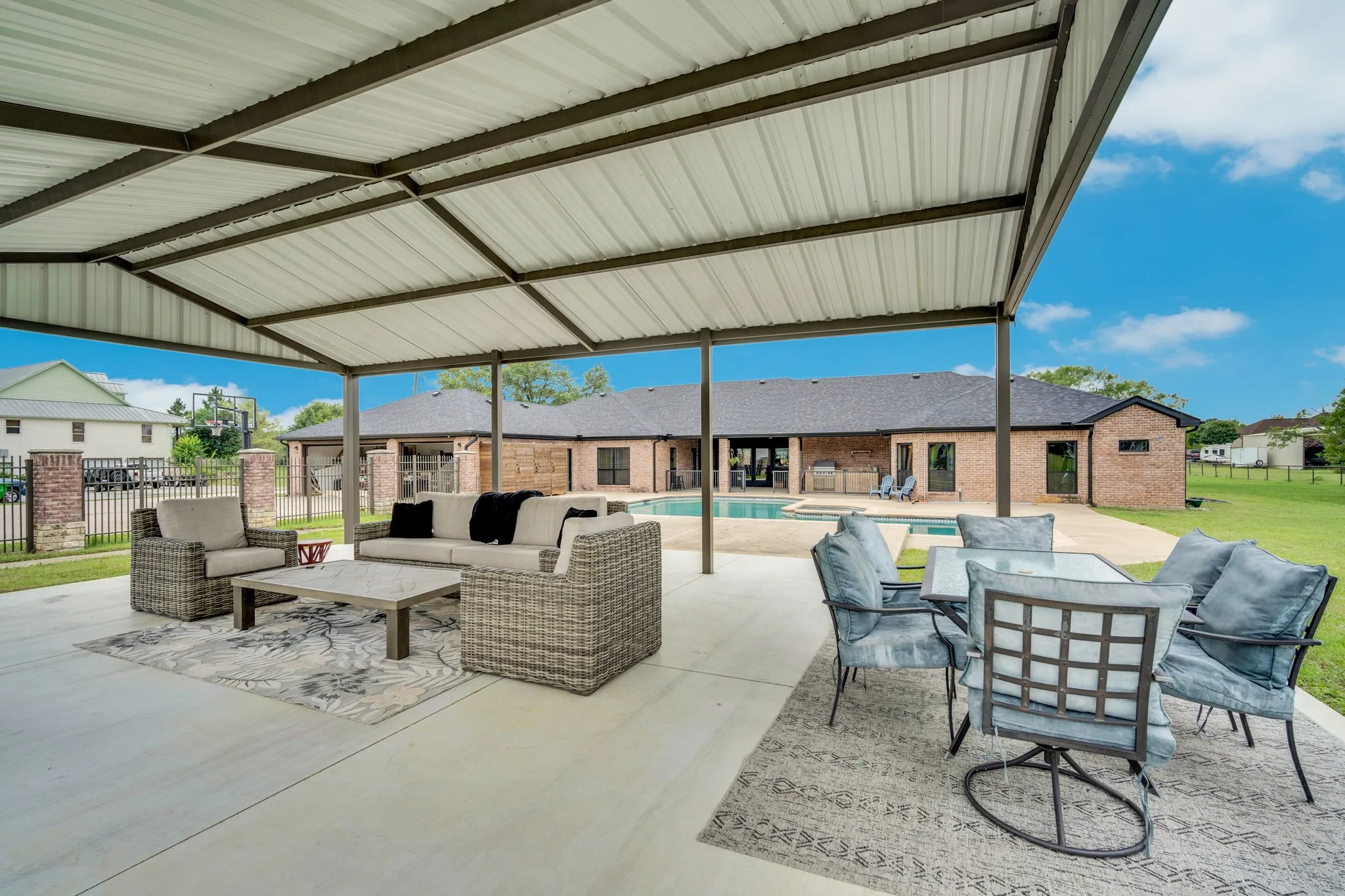Expansive covered patio with concrete flooring