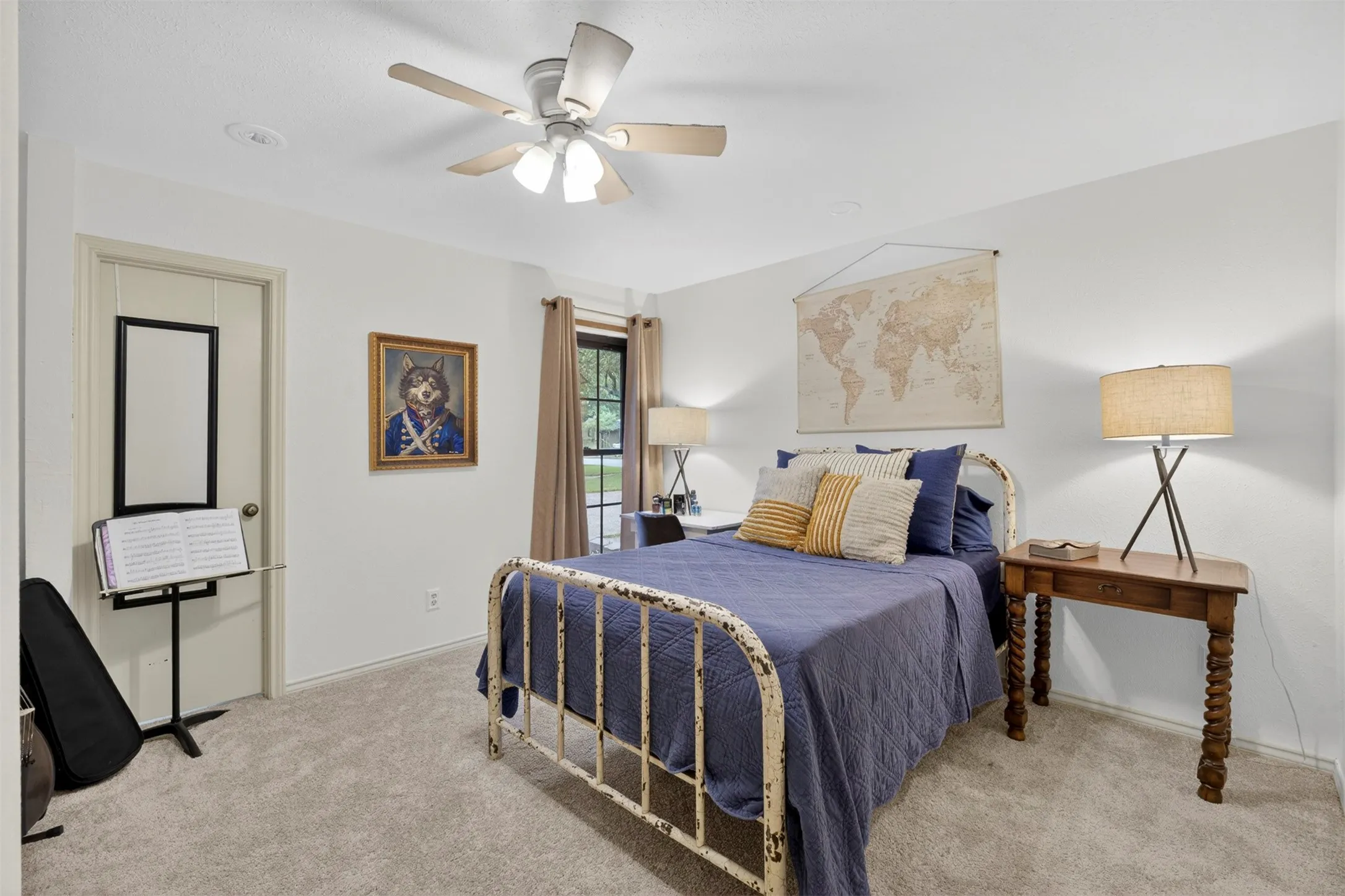 Neutral-toned wall paint and light-colored carpet flooring create a bright ambiance