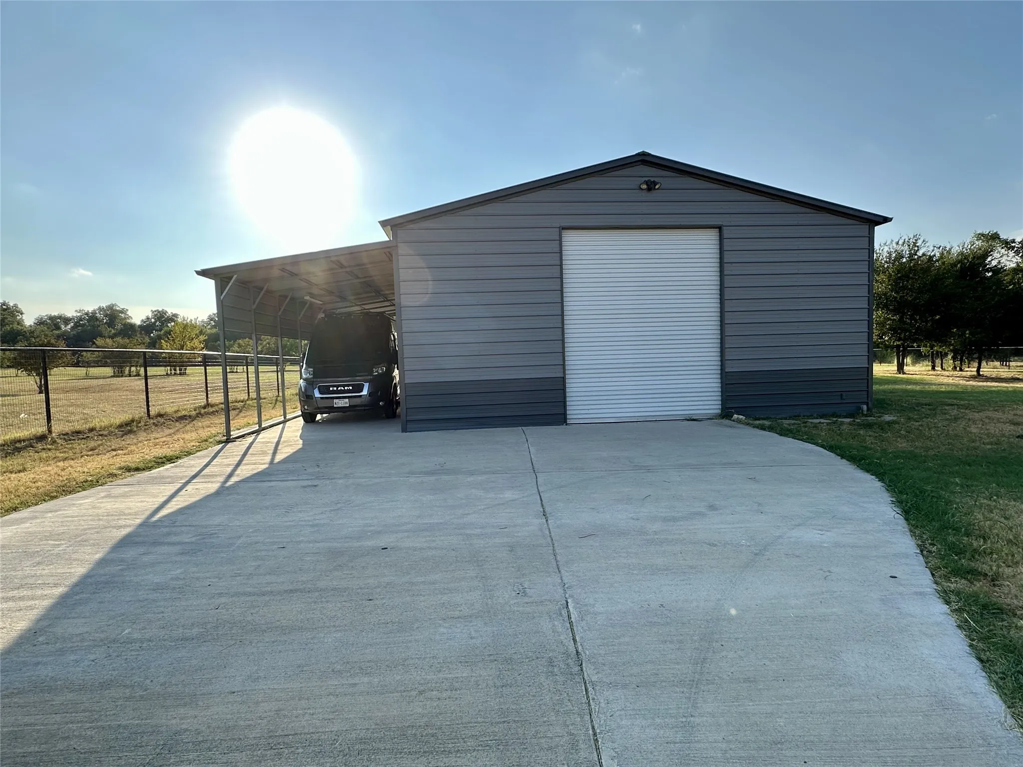 front entrance to secondary garage and workshop RV and 2 covered parking spaces