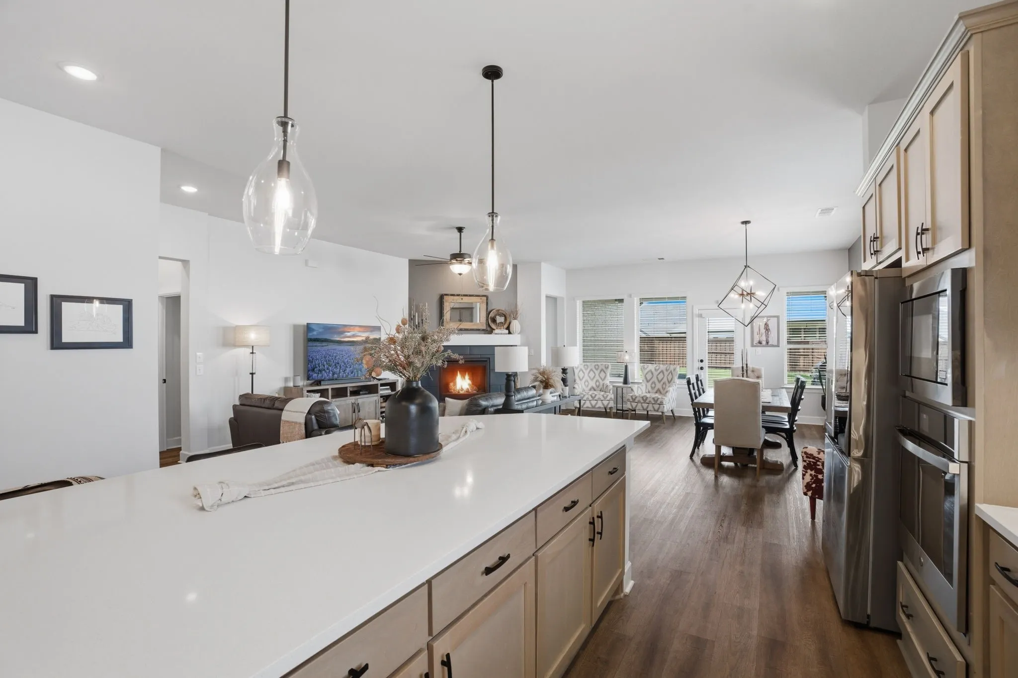 This large and inviting kitchen island is an excellent feature, providing ample counter space and making it the ideal spot for gatherings and creating lasting memories with family and friends.