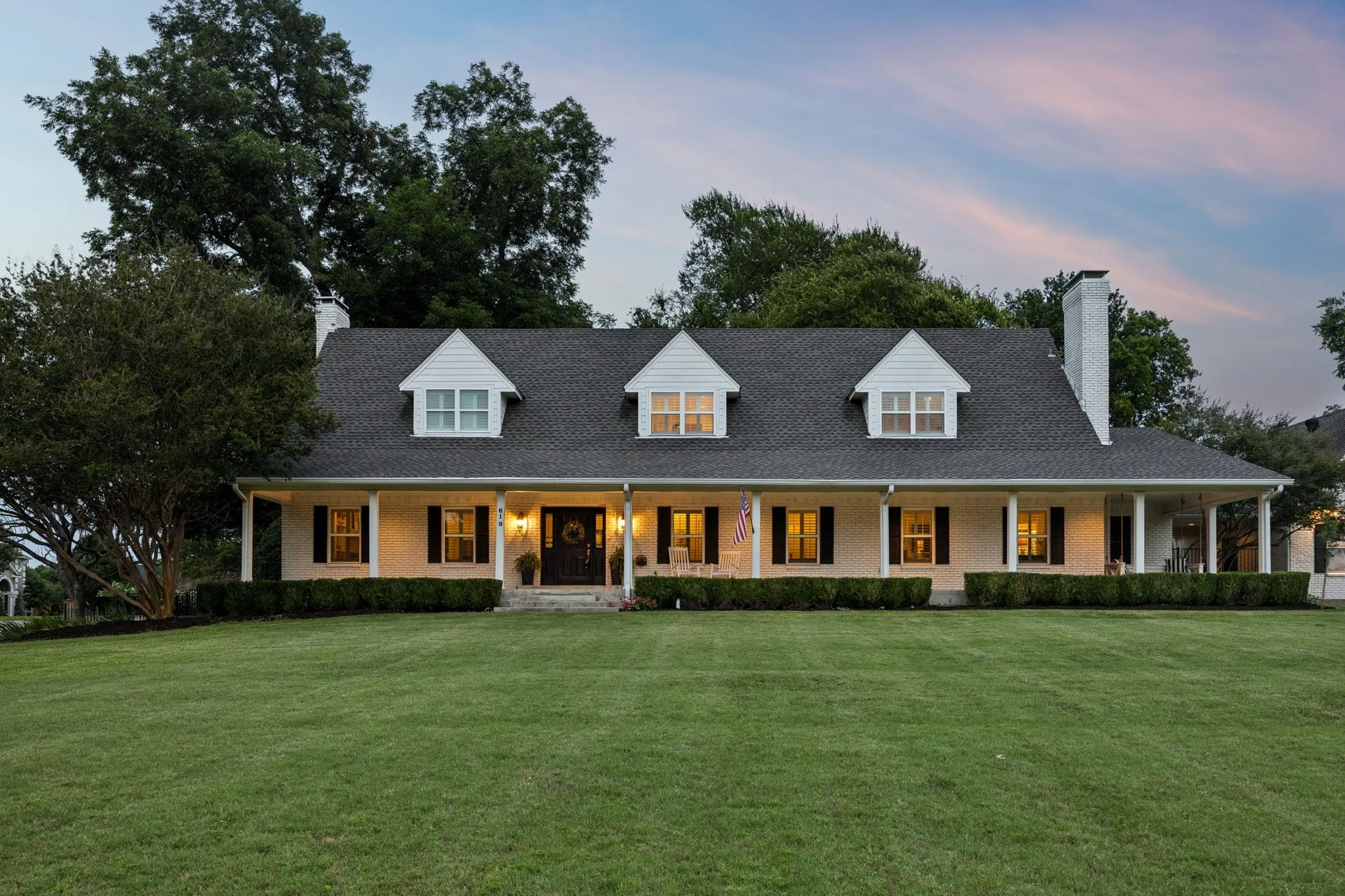 You'll love sitting on this expansive porch in the evenings too!
