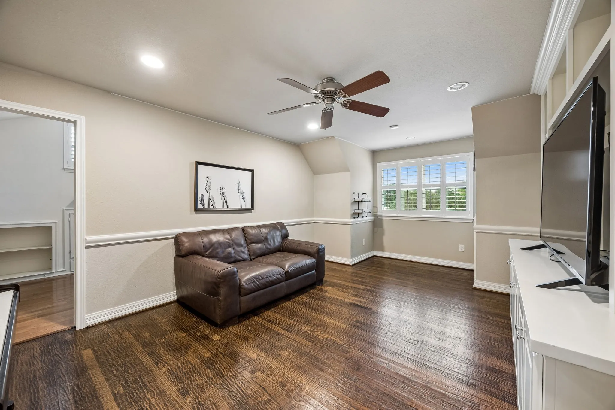 Upstairs bonus room can be used as flex space or another bedroom.