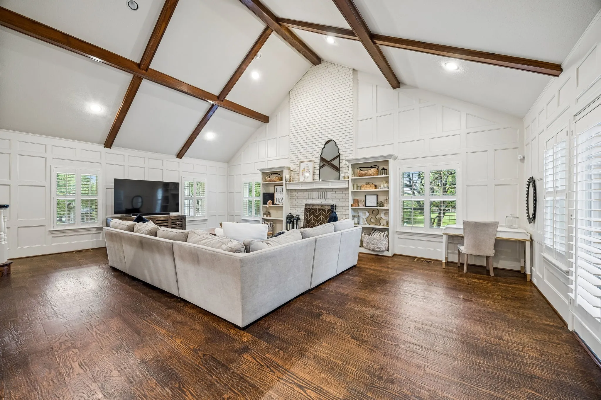 Plenty of space for a dining table on the right side of this room