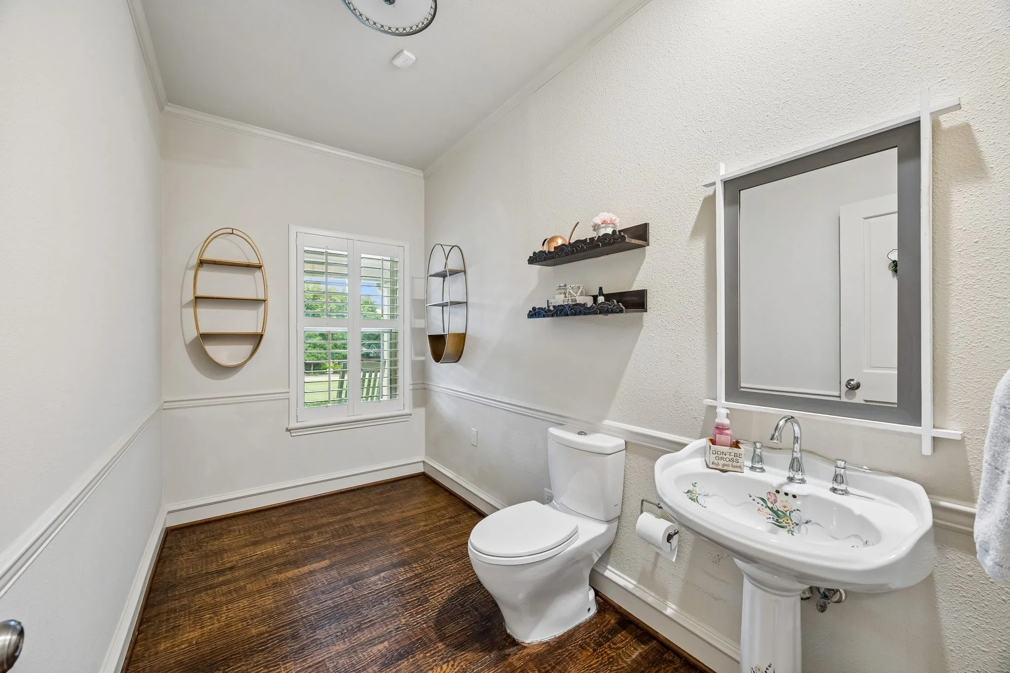 Oversized half bath downstairs.