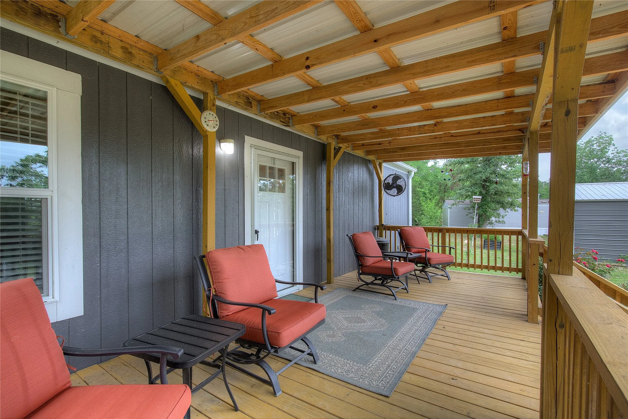Beautiful covered front porch with lake views!