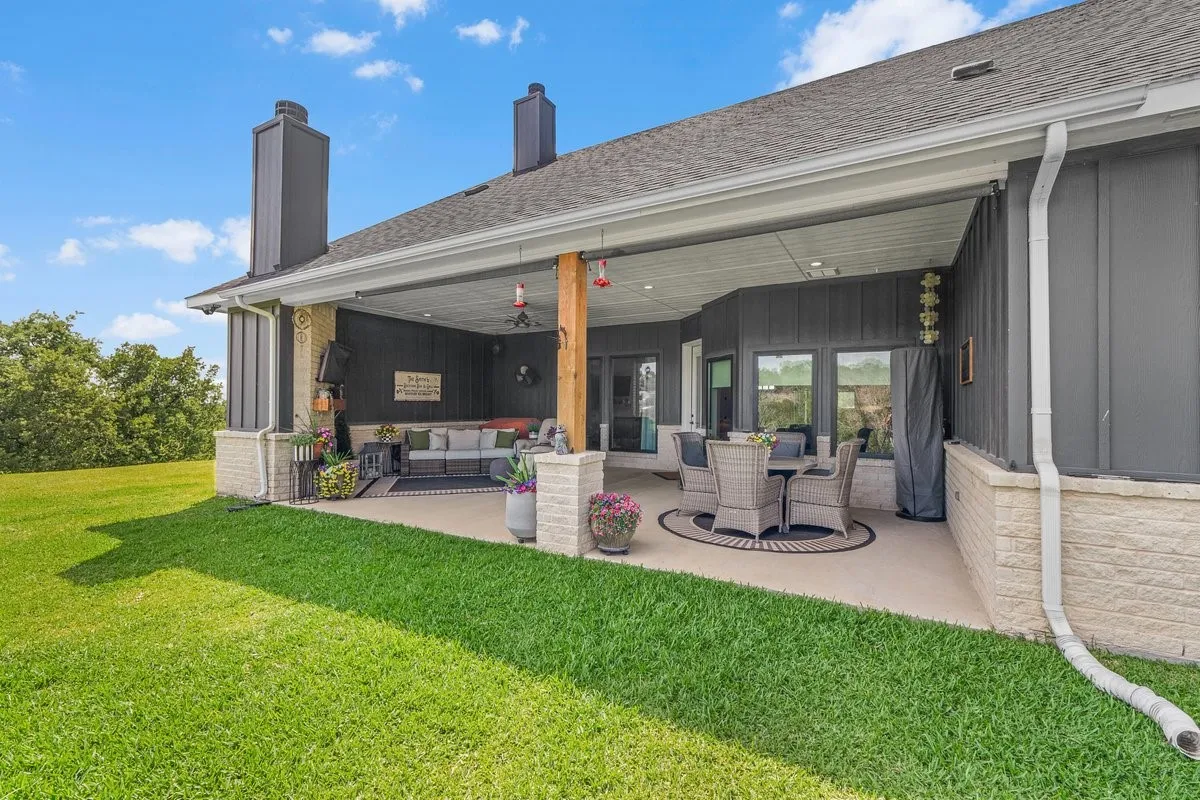 Expansive covered patio featuring recessed lighting, and a wood structural post