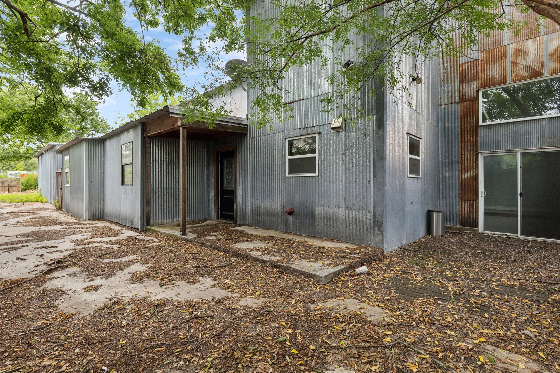 *Door off of the 'kitchen', along with sliding doors from the sitting area.*