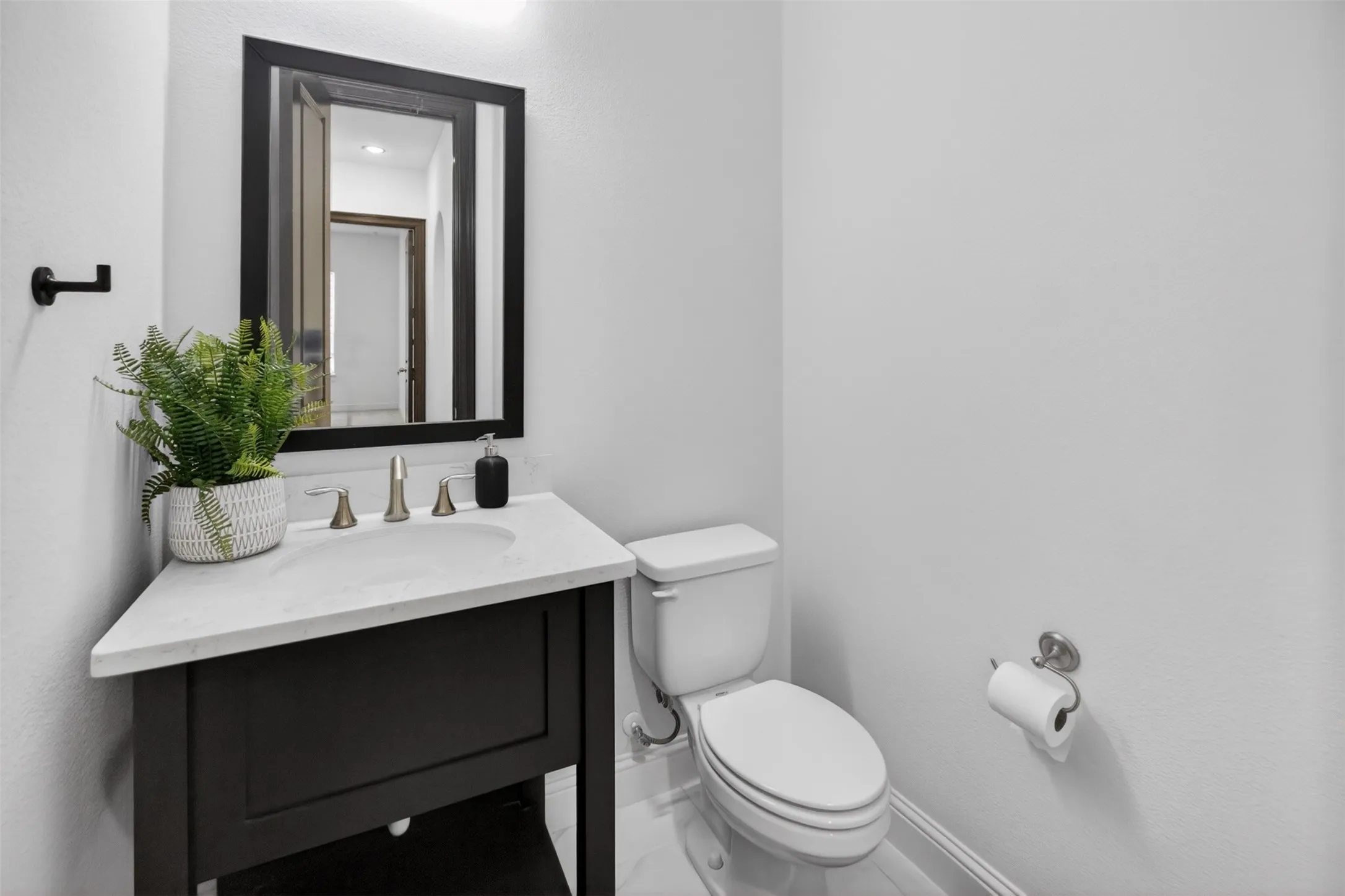 Hallway Half Bathroom down