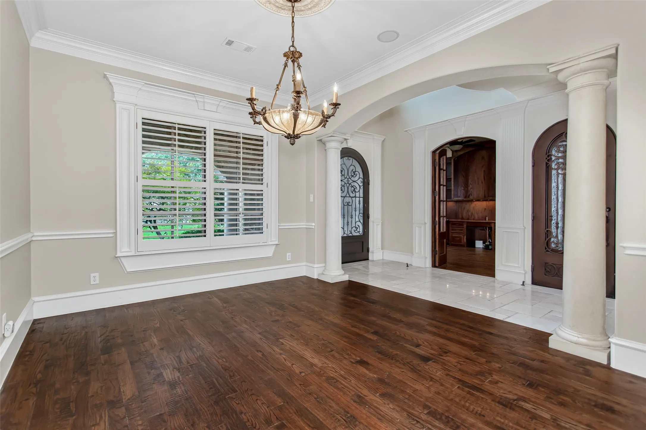 Conveniently located adjacent to the butler's pantry, the formal dining room offers an elegant setting for effortless entertaining.