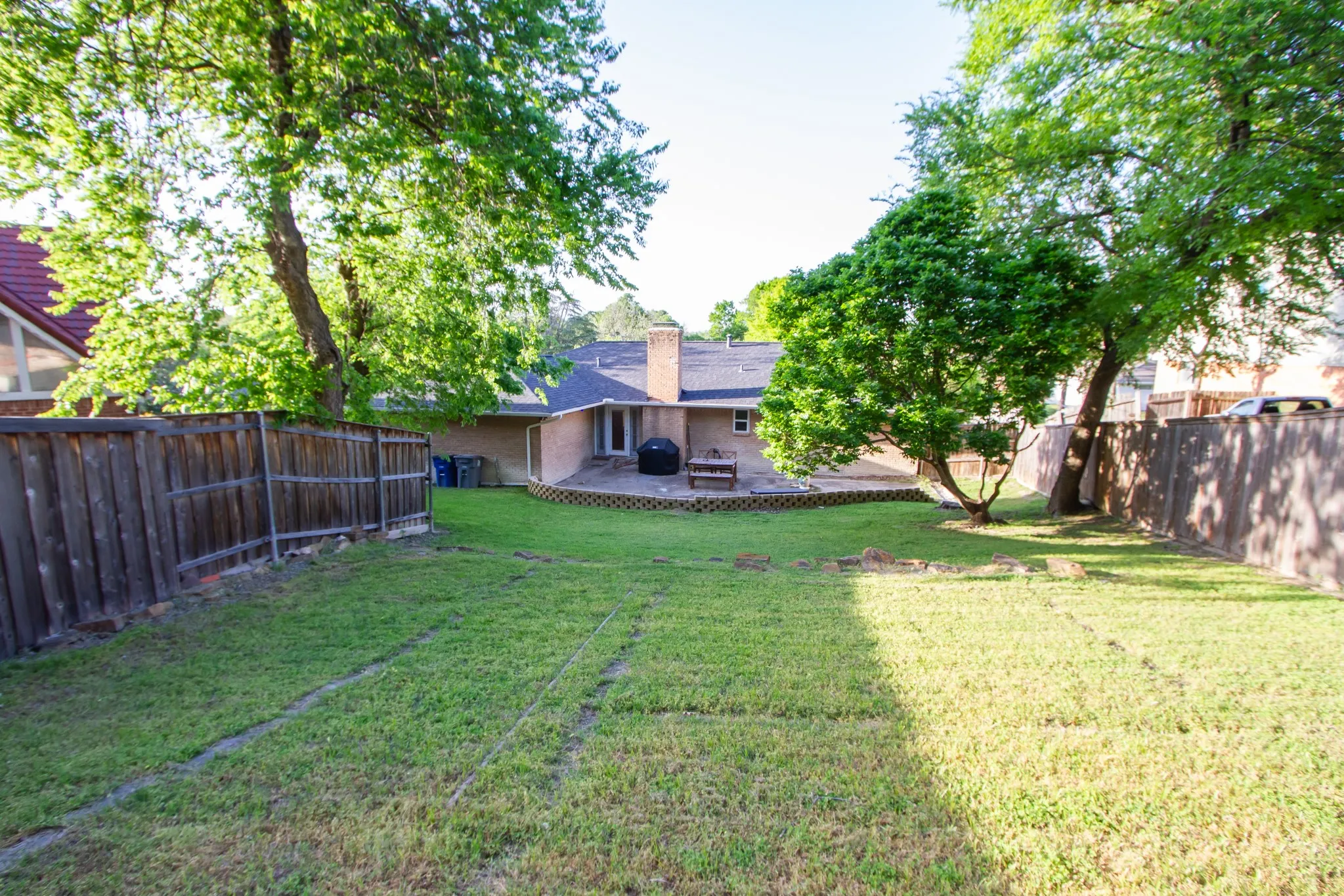 View of yard with a patio area and a fenced backyard