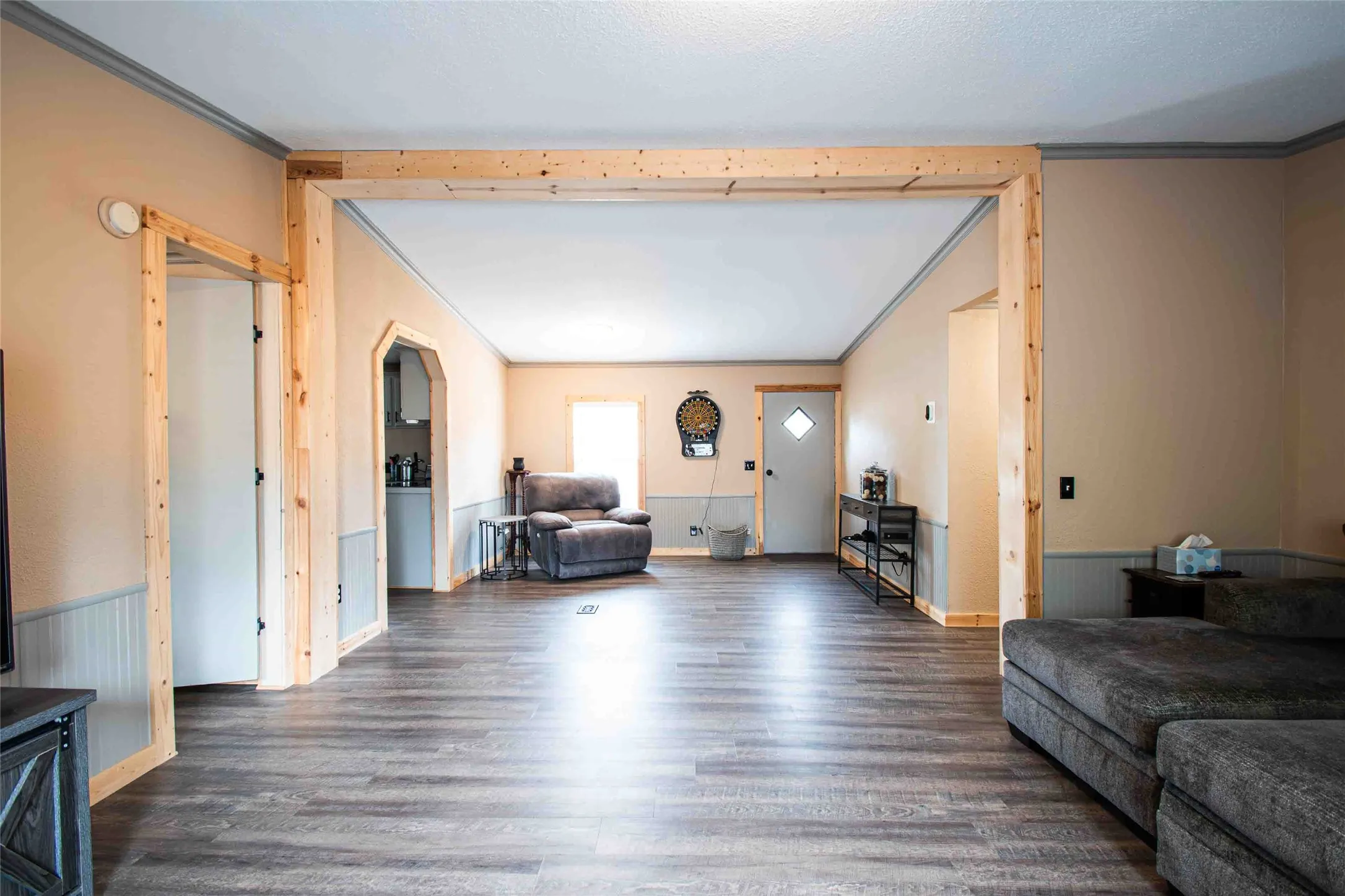 Large living area with new flooring