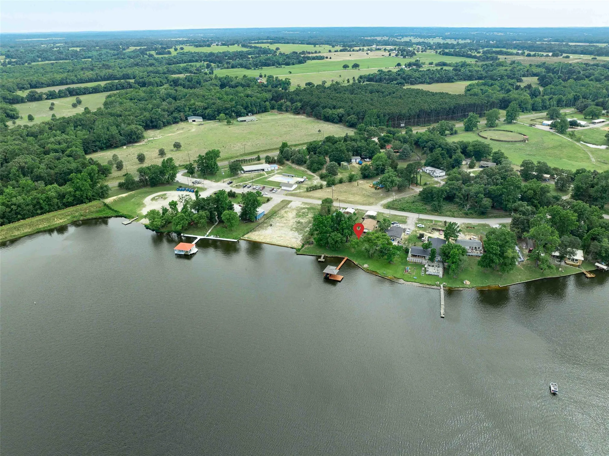 Water view of home.  Note red pin marker