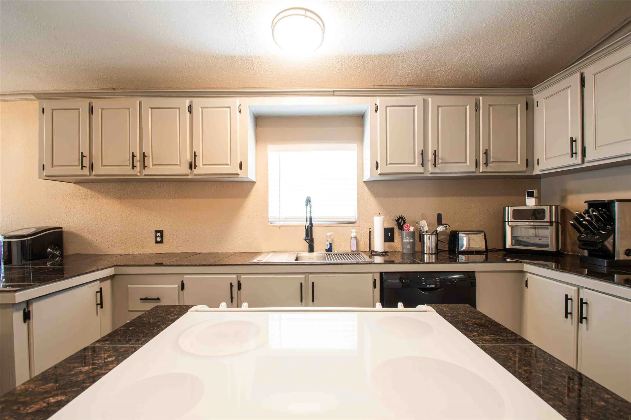 cook top and oven in center island