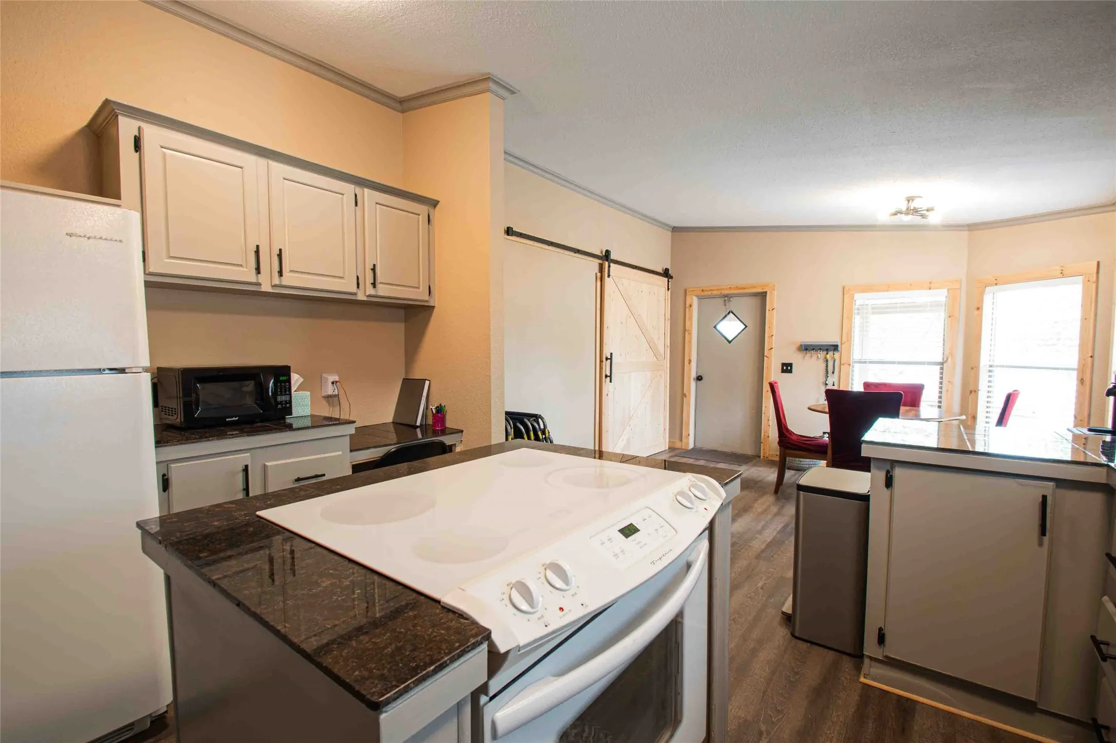 includes desk area in kitchen