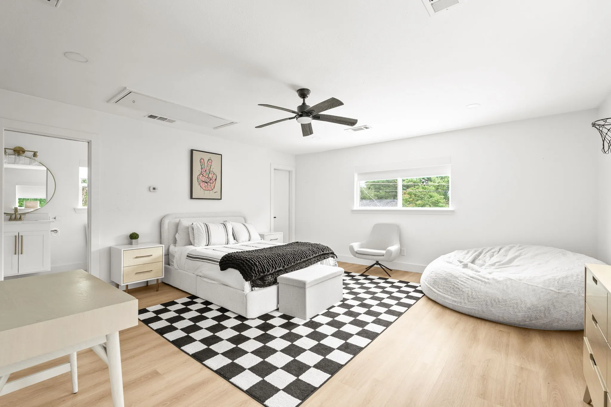 Bright interior space with light wood-finish flooring
