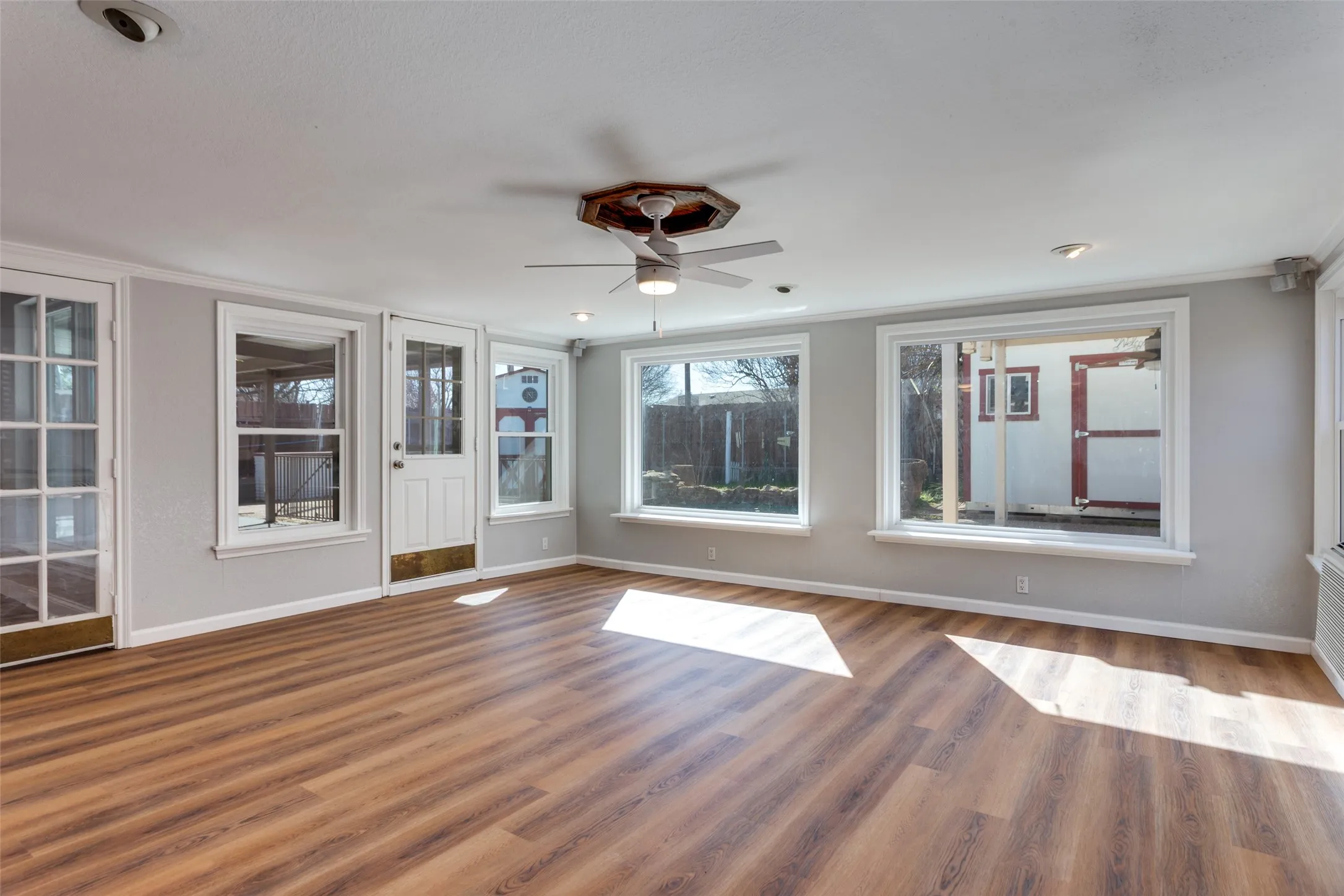 Extra large flex space - great natural light with view of backyard pool